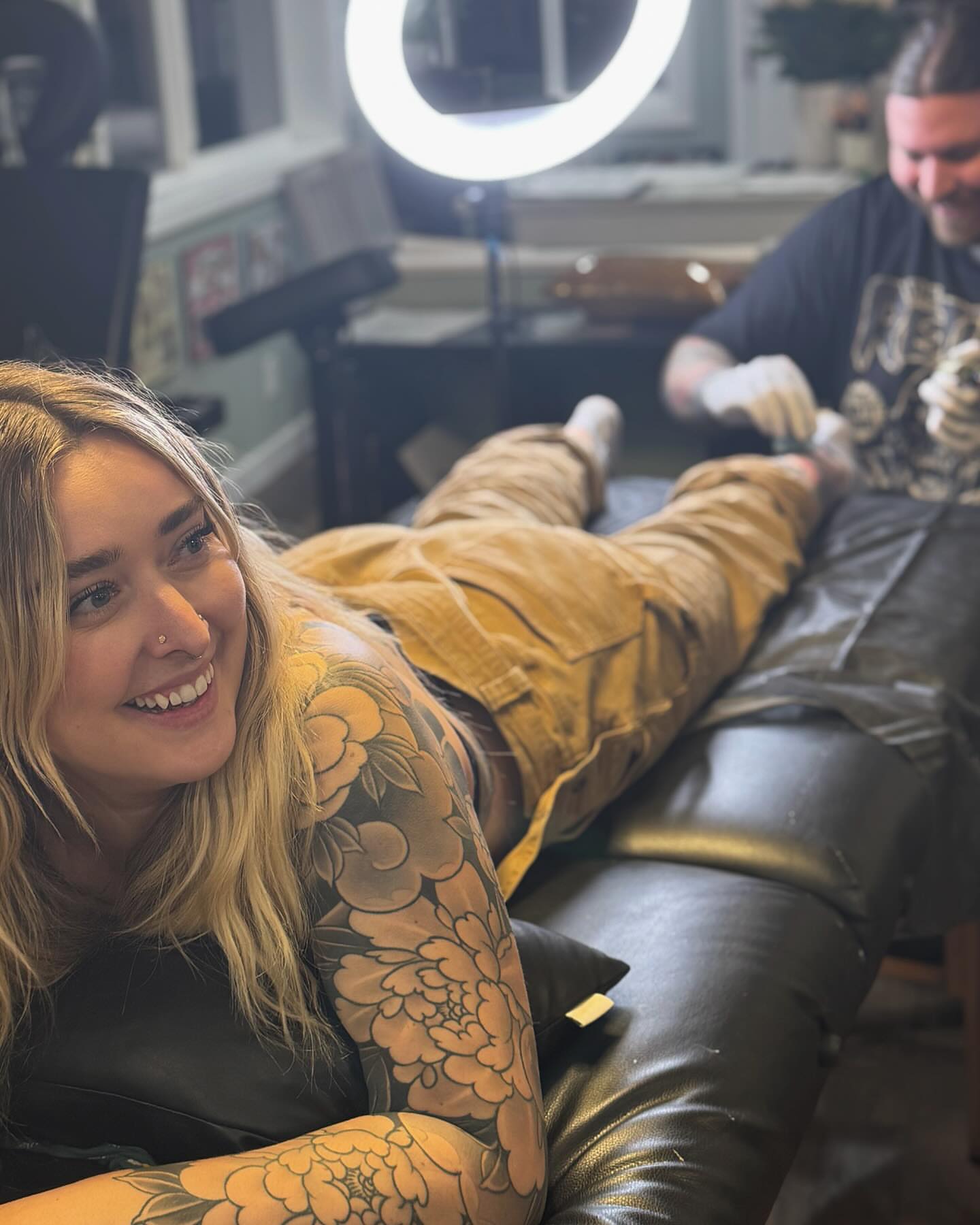 Floral American traditional tattoo on the upper arm by Amanda Marie, Edmonds, Washington
