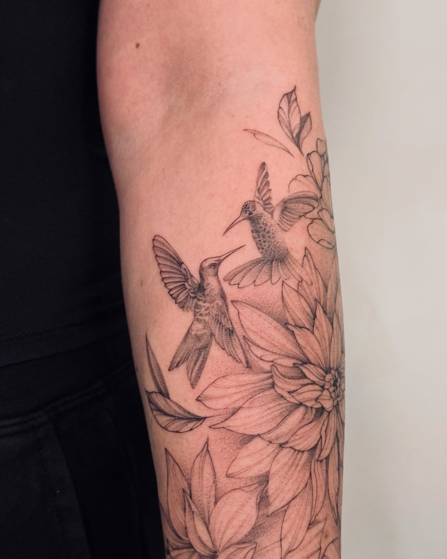 Hummingbirds and flowers realism tattoo on the forearm by Anastasiia Pakhanova ♥ tattoo artist
