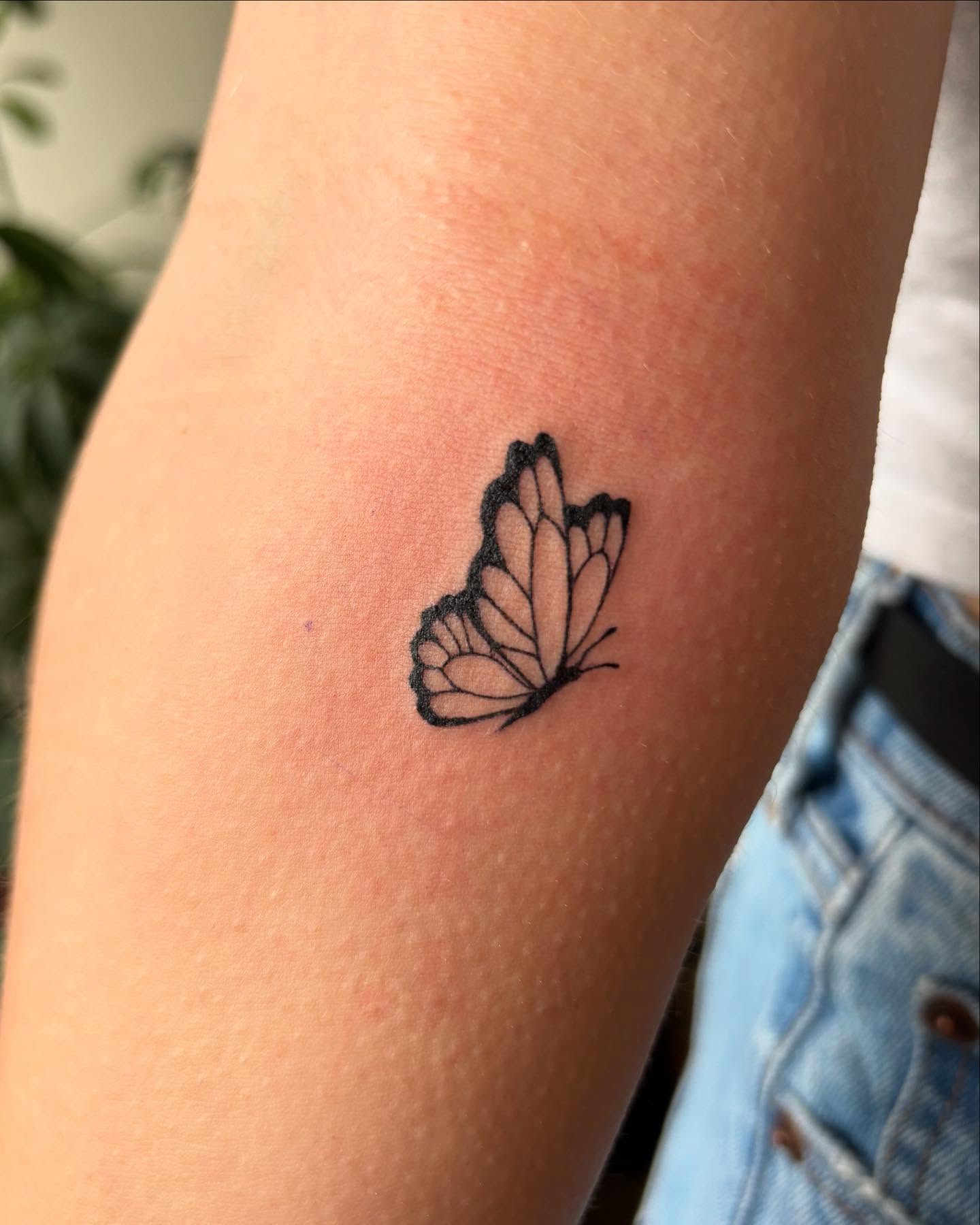 Butterfly black and grey tattoo on the forearm by Anna Kathleen, Des Moines, Iowa