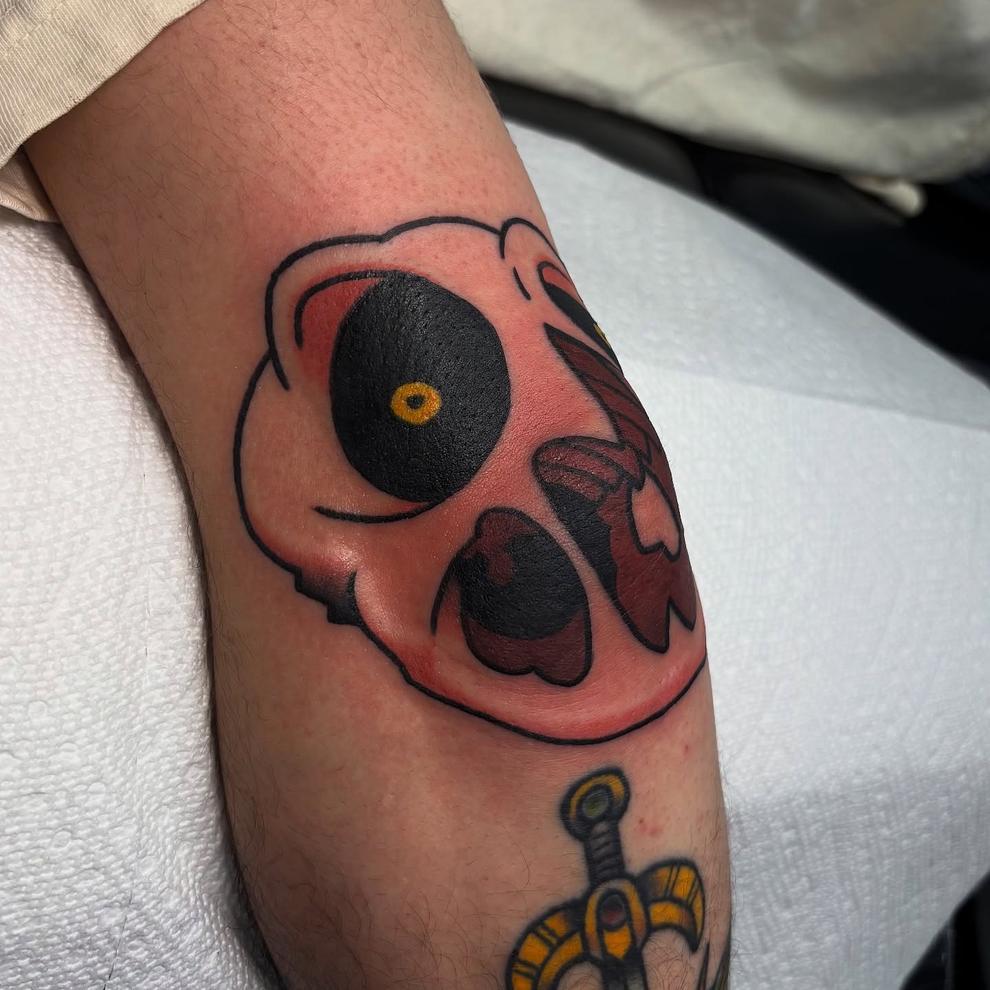 Octopus American traditional tattoo on the forearm by Dyllan Shipley