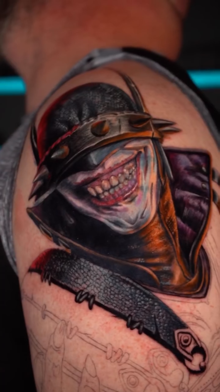 The Batman Who Laughs realism tattoo by Keebs