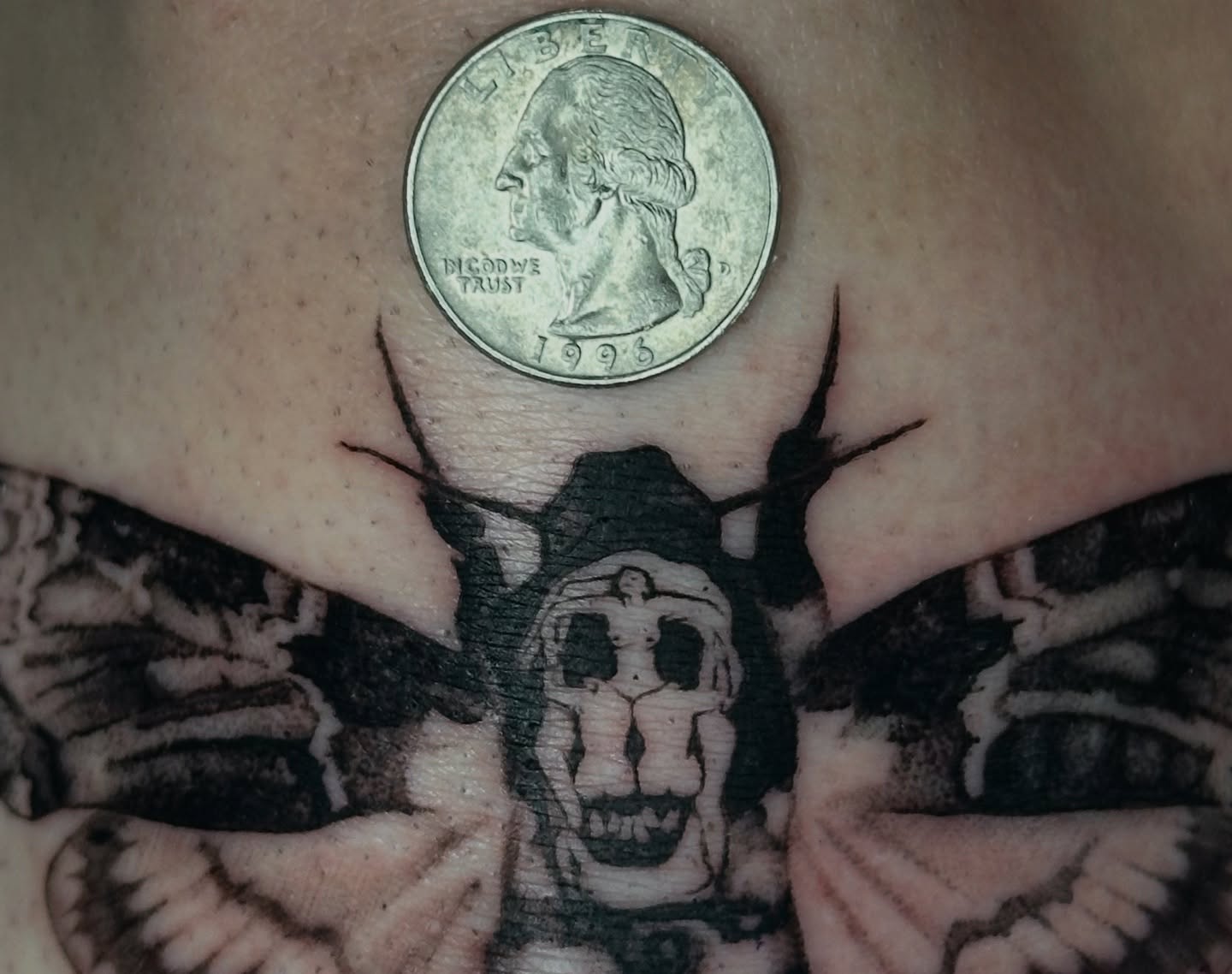 Skull with wings black and grey tattoo on the back by Winters Ashurst - St. George tattoo artist