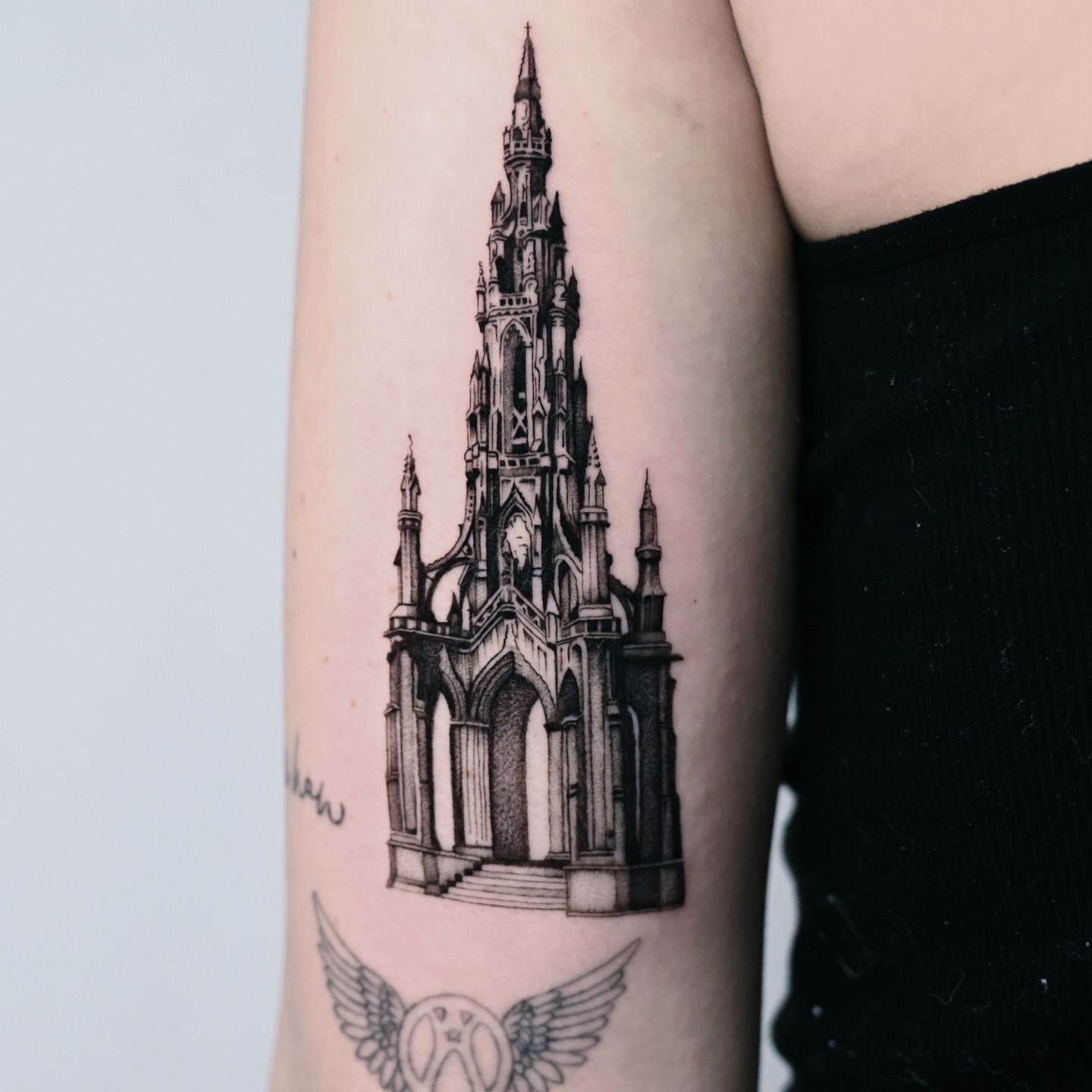 Gothic cathedral black and grey tattoo on the forearm by dom