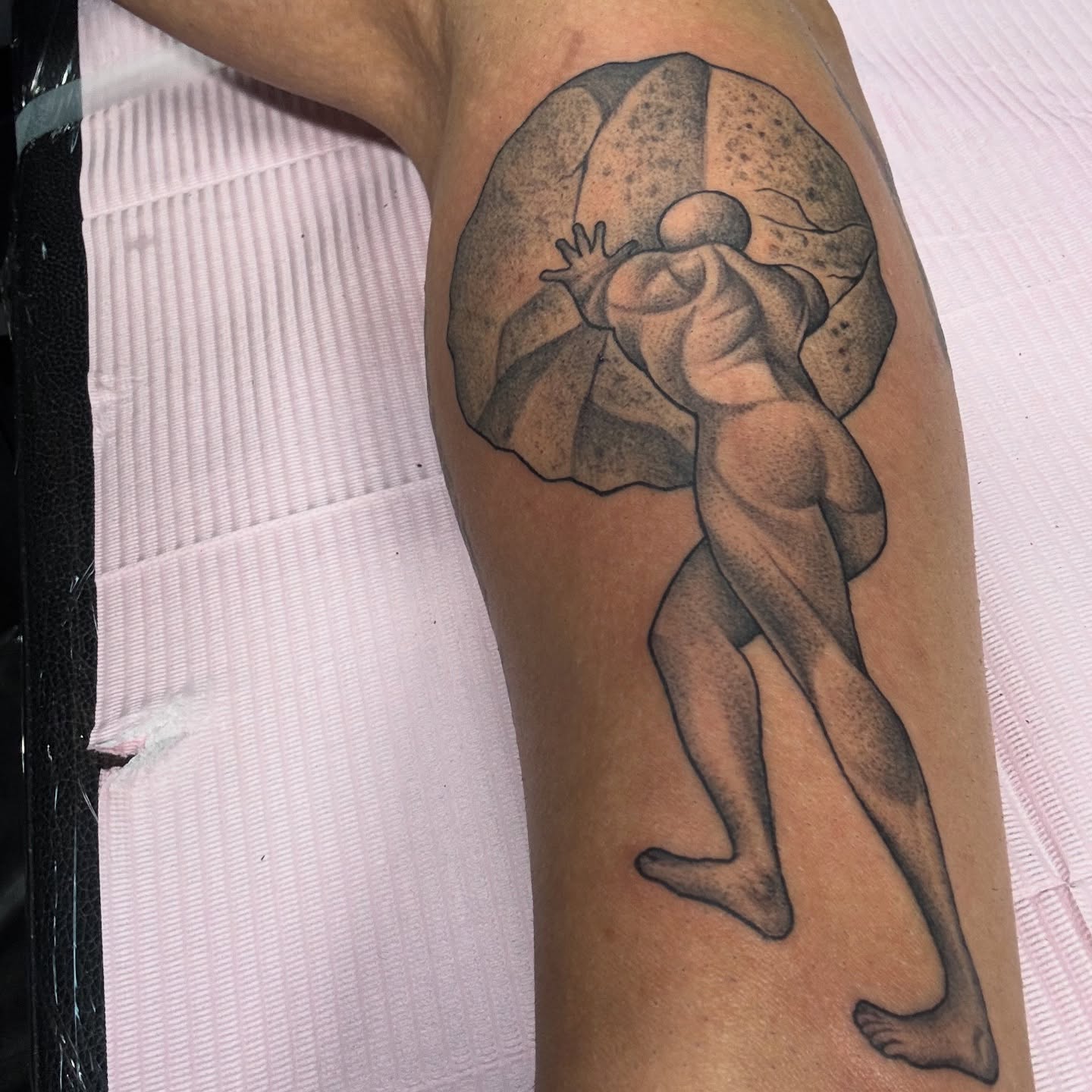 Statue-like figure dotwork tattoo on the forearm by Mac Obaob