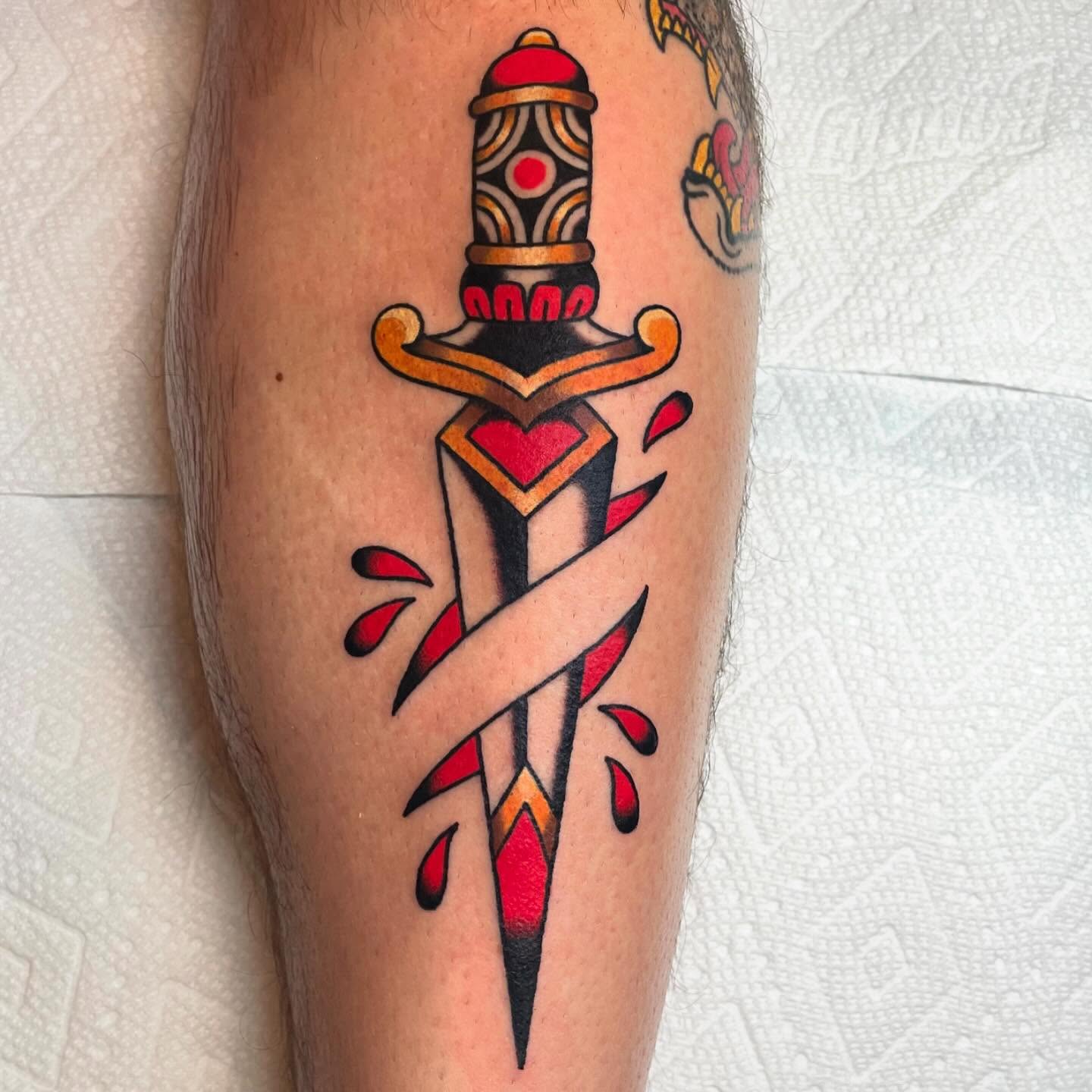 Sword American traditional tattoo on the forearm by Nova Vaughn