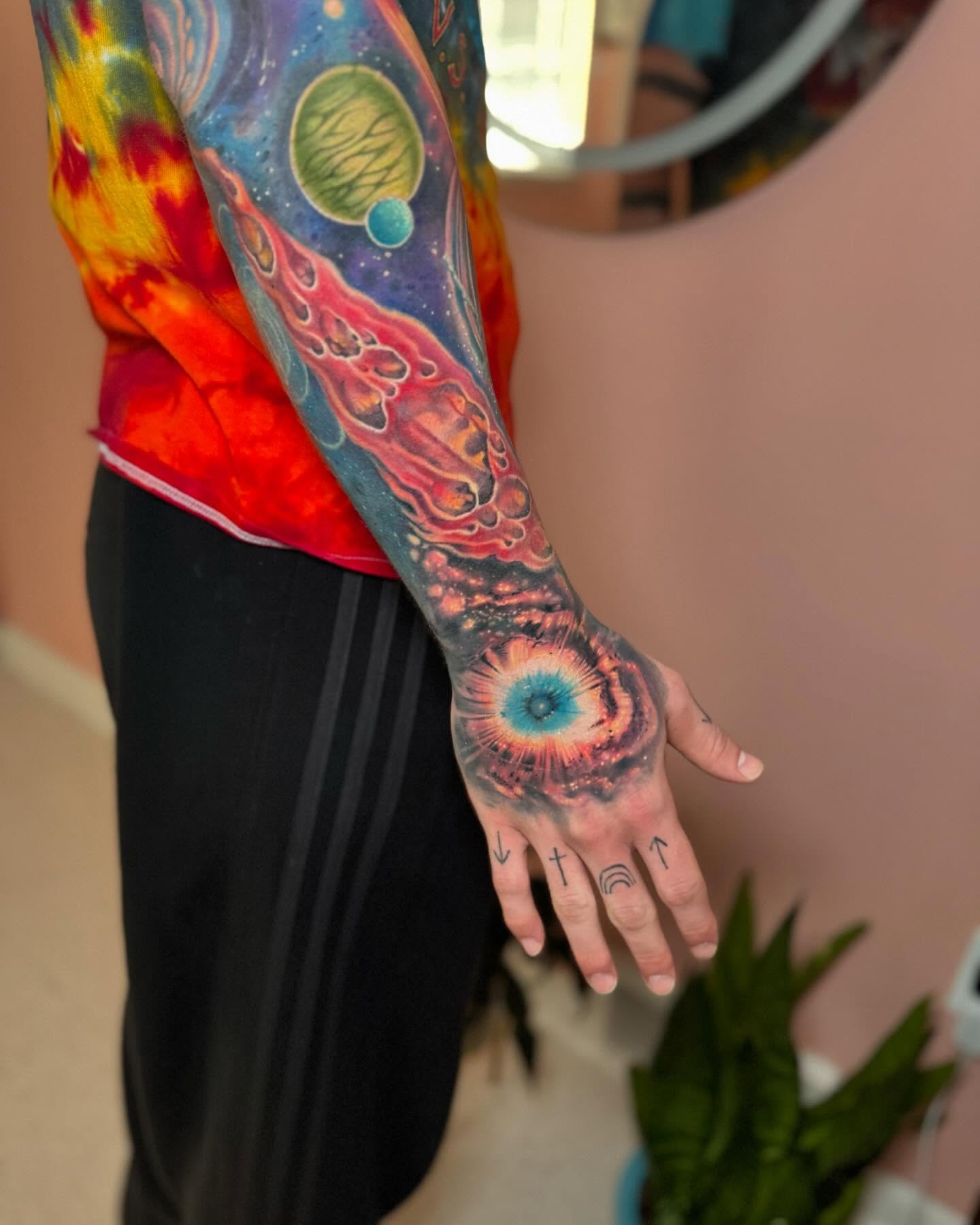 Galaxy dotwork tattoo on the upper arm by Steve Gentile Tattoos