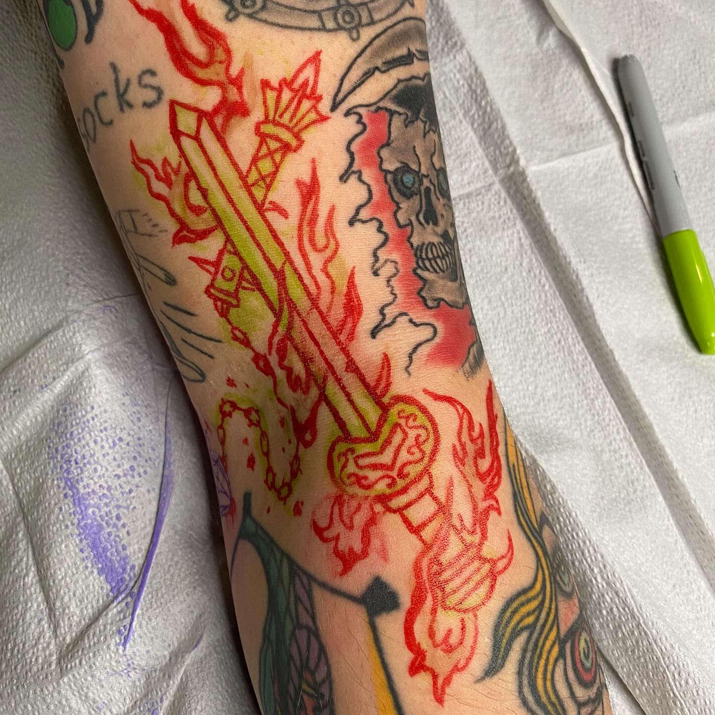 Flame and skull American traditional tattoo on the forearm by Morgana Sutherland