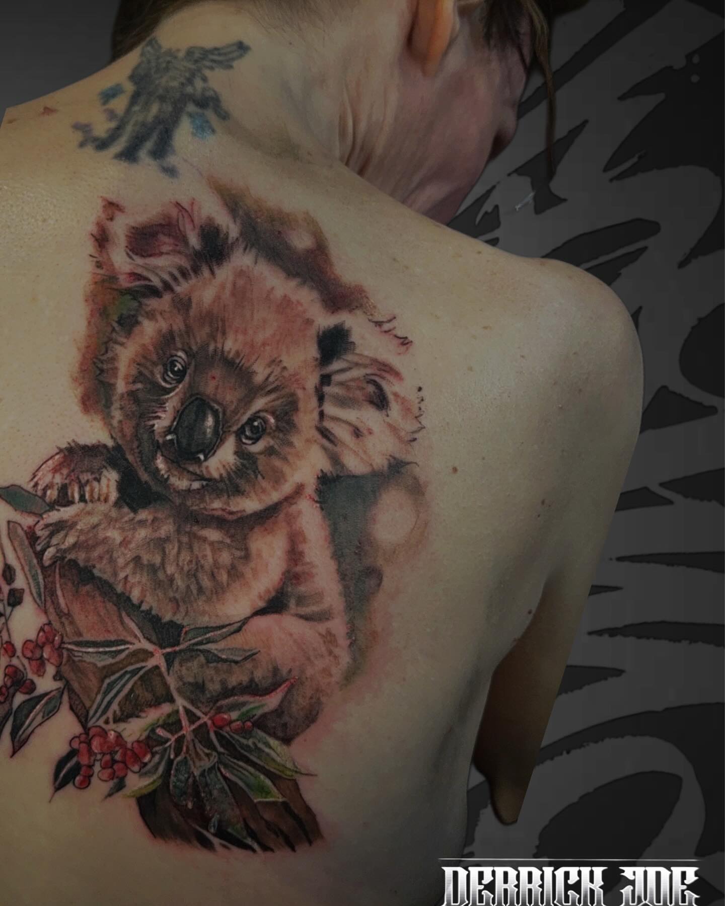 Koala realism tattoo on the back by Derrick Joe tattoos