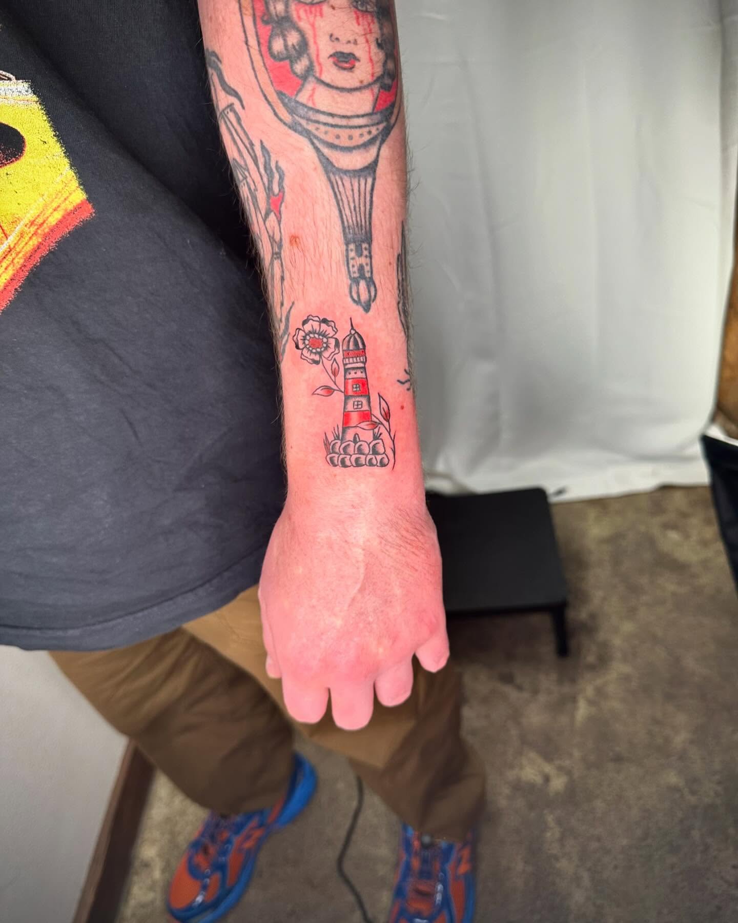 Lighthouse dotwork tattoo on the forearm by rory