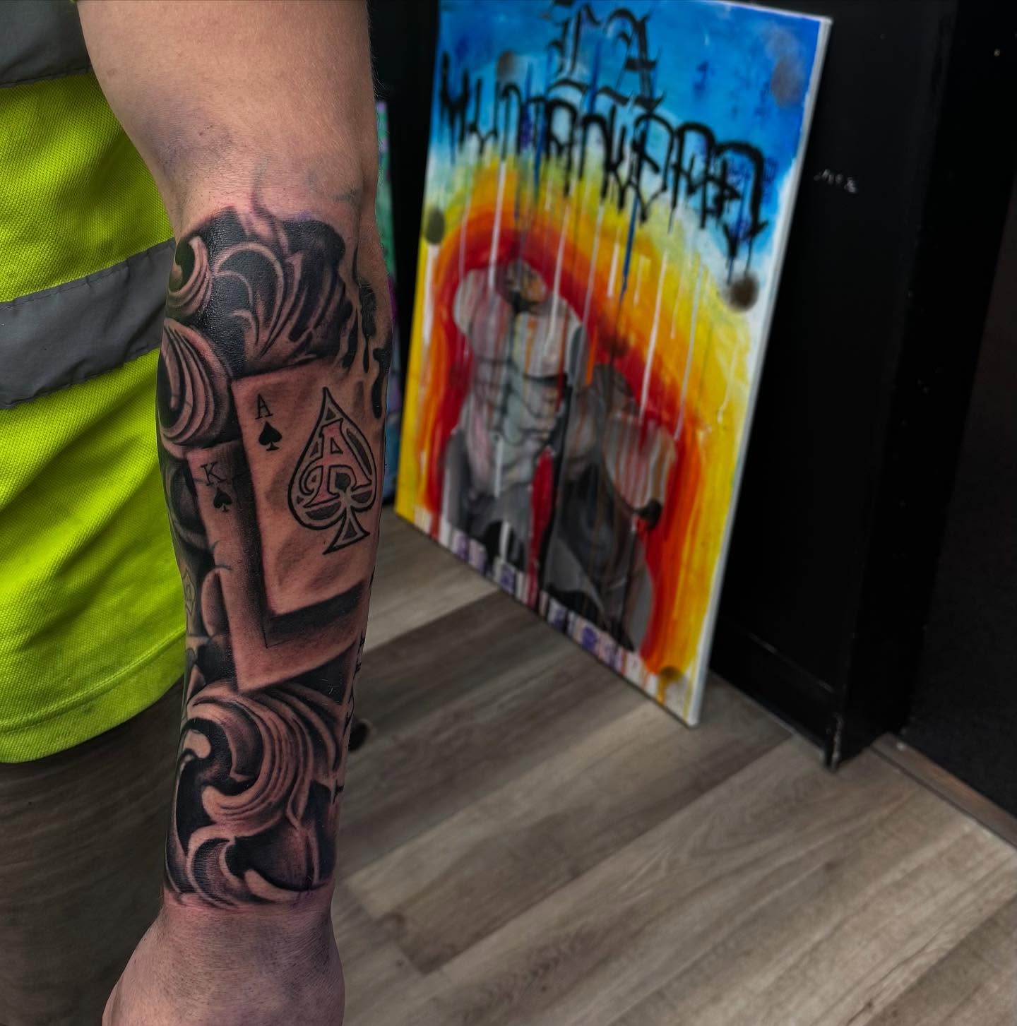 Playing cards and roses realism tattoo on the forearm by Lu Ve, Dayton, Ohio