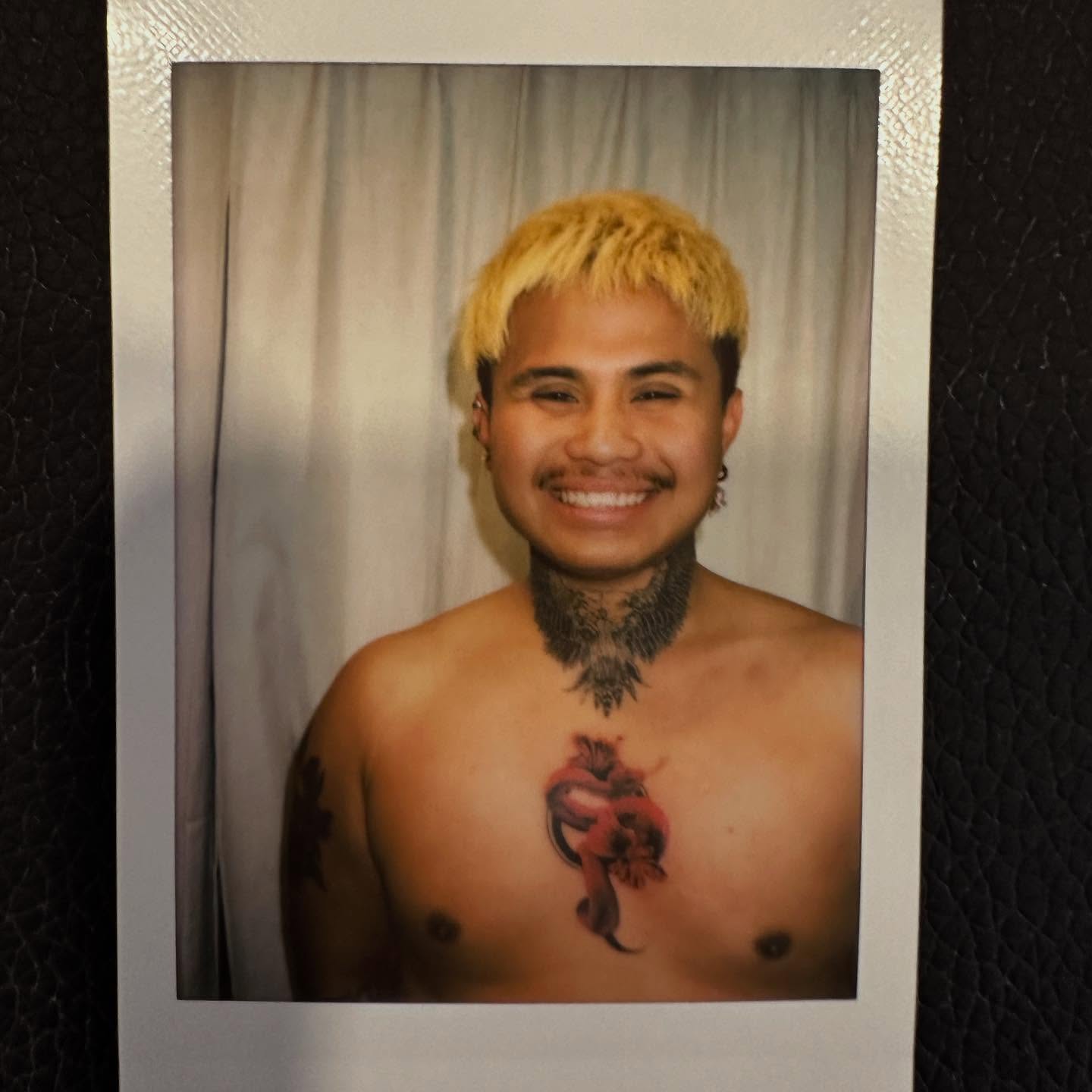 Heart American traditional tattoo on the chest by Bennie Bae