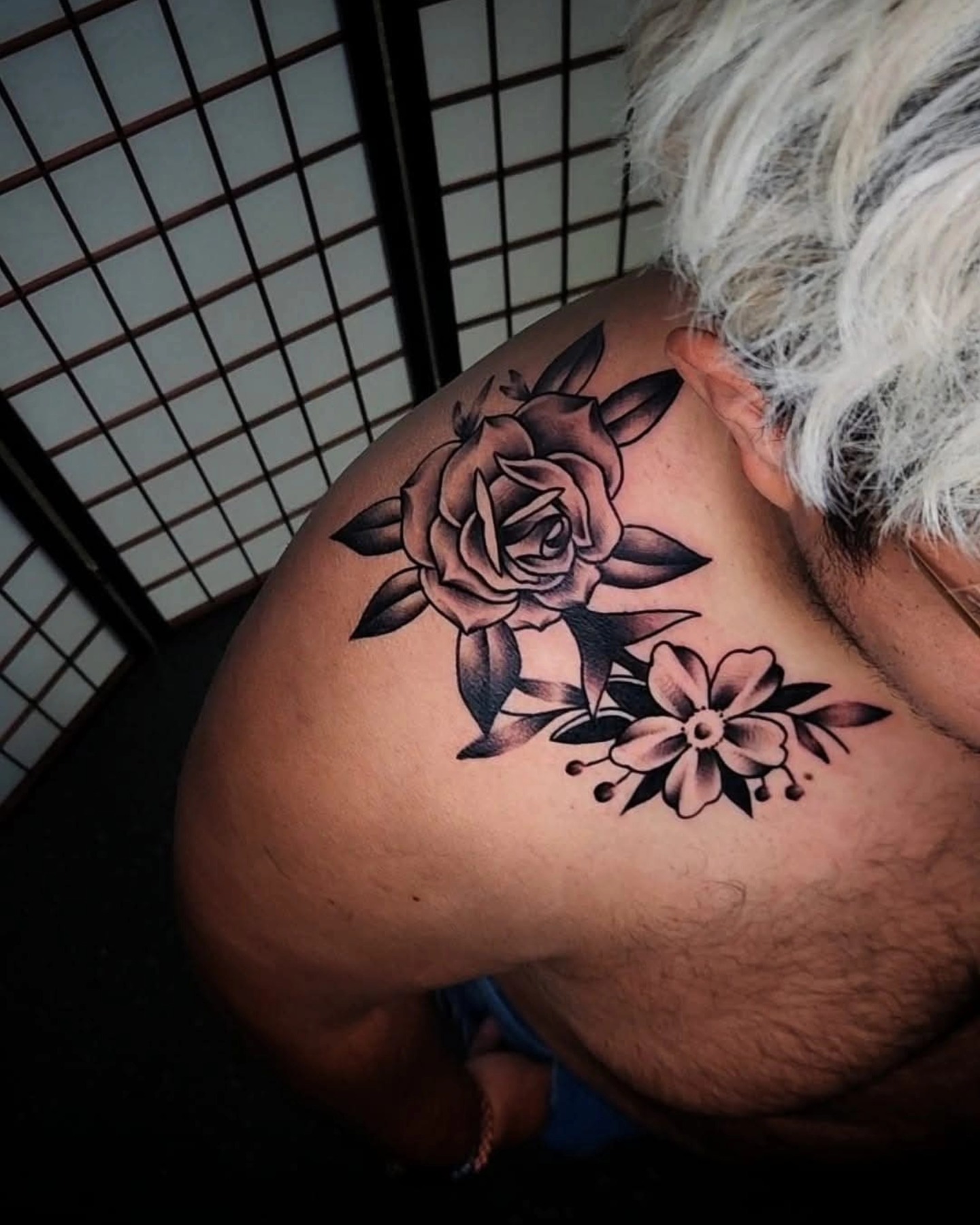 Rose and flower American traditional tattoo on the shoulder by ⚔️ Shane ⚔️
