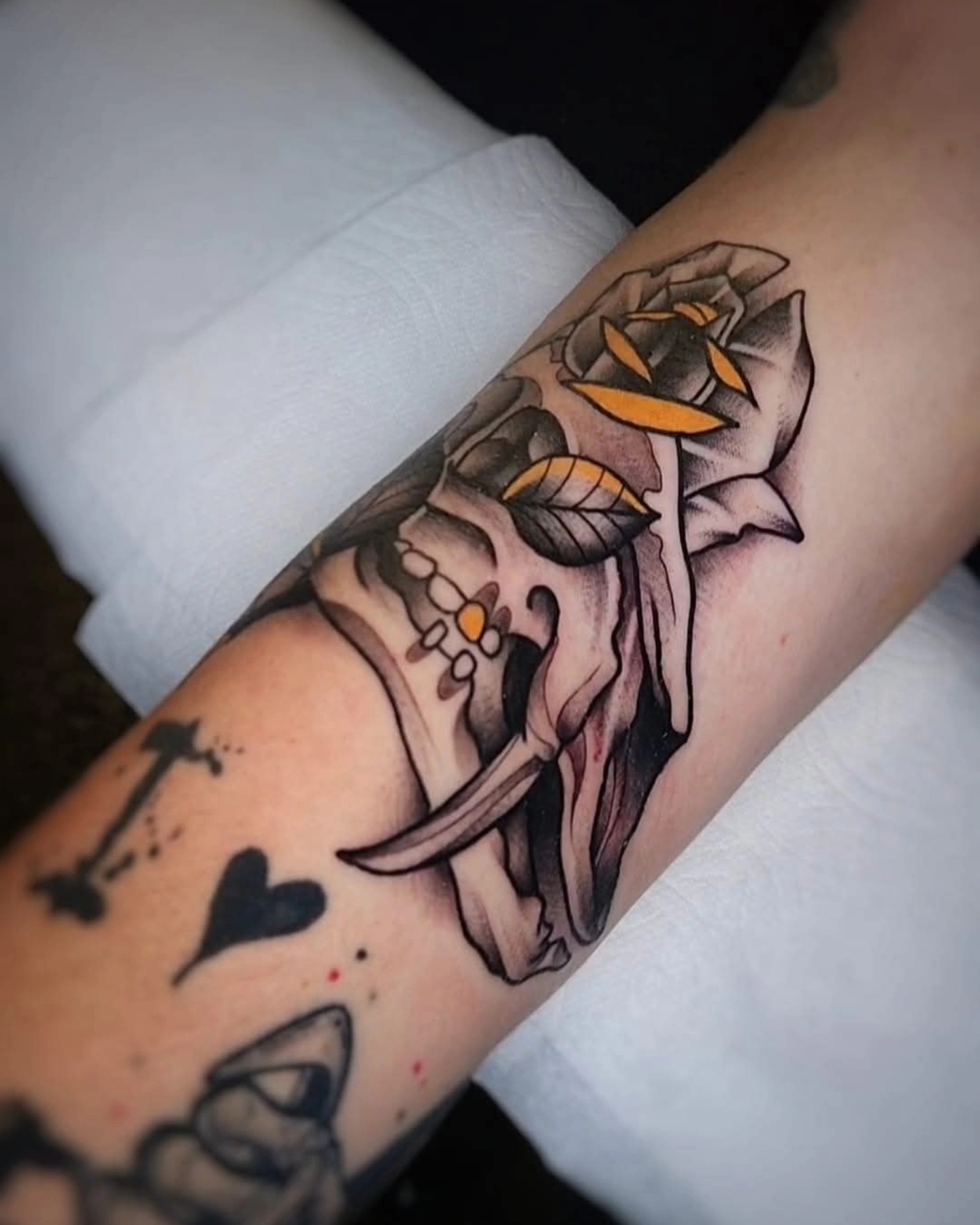 Skull with roses American traditional tattoo on the forearm by ⚔️ Shane ⚔️