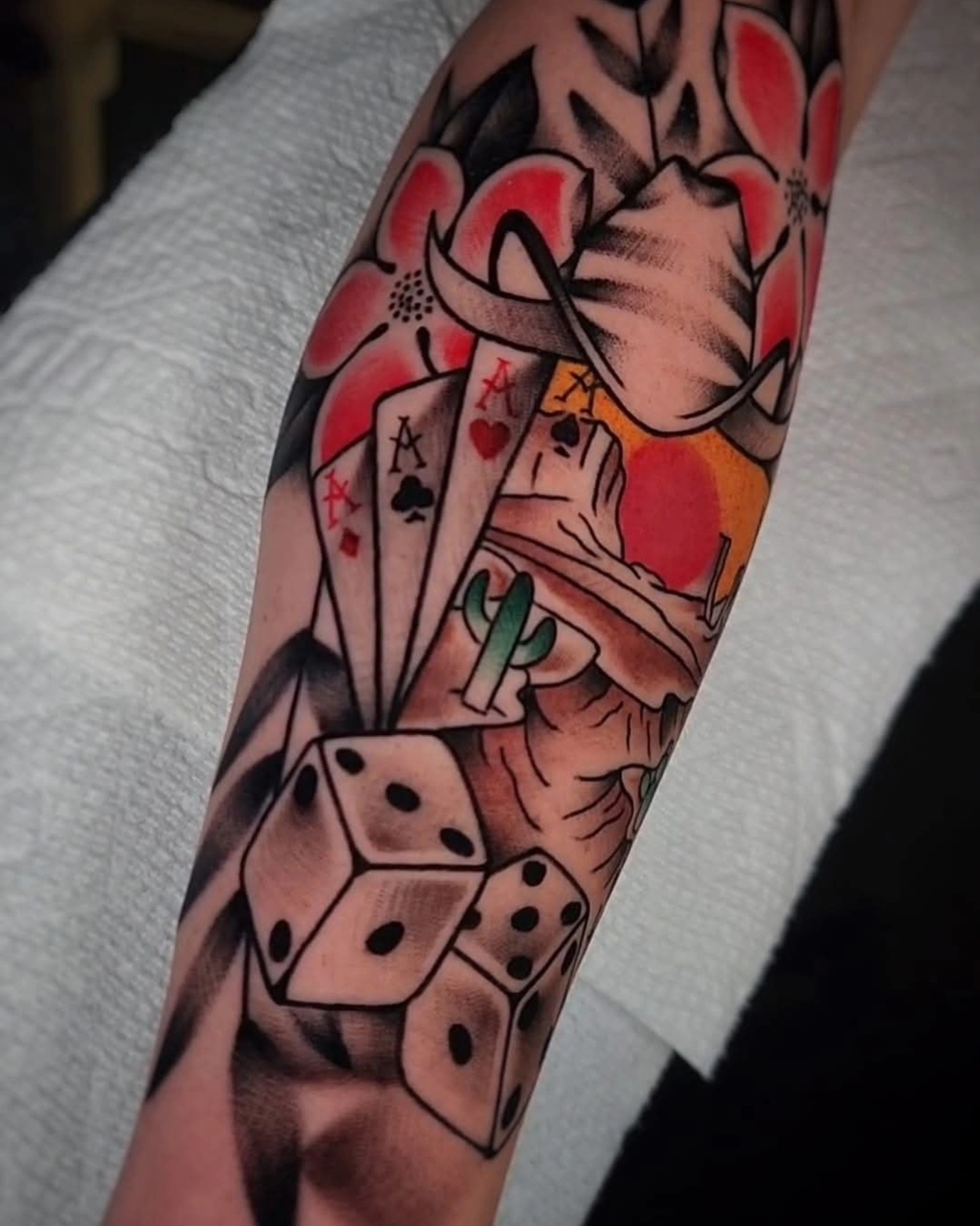 Playing cards and dice American traditional tattoo on the forearm by ⚔️ Shane ⚔️