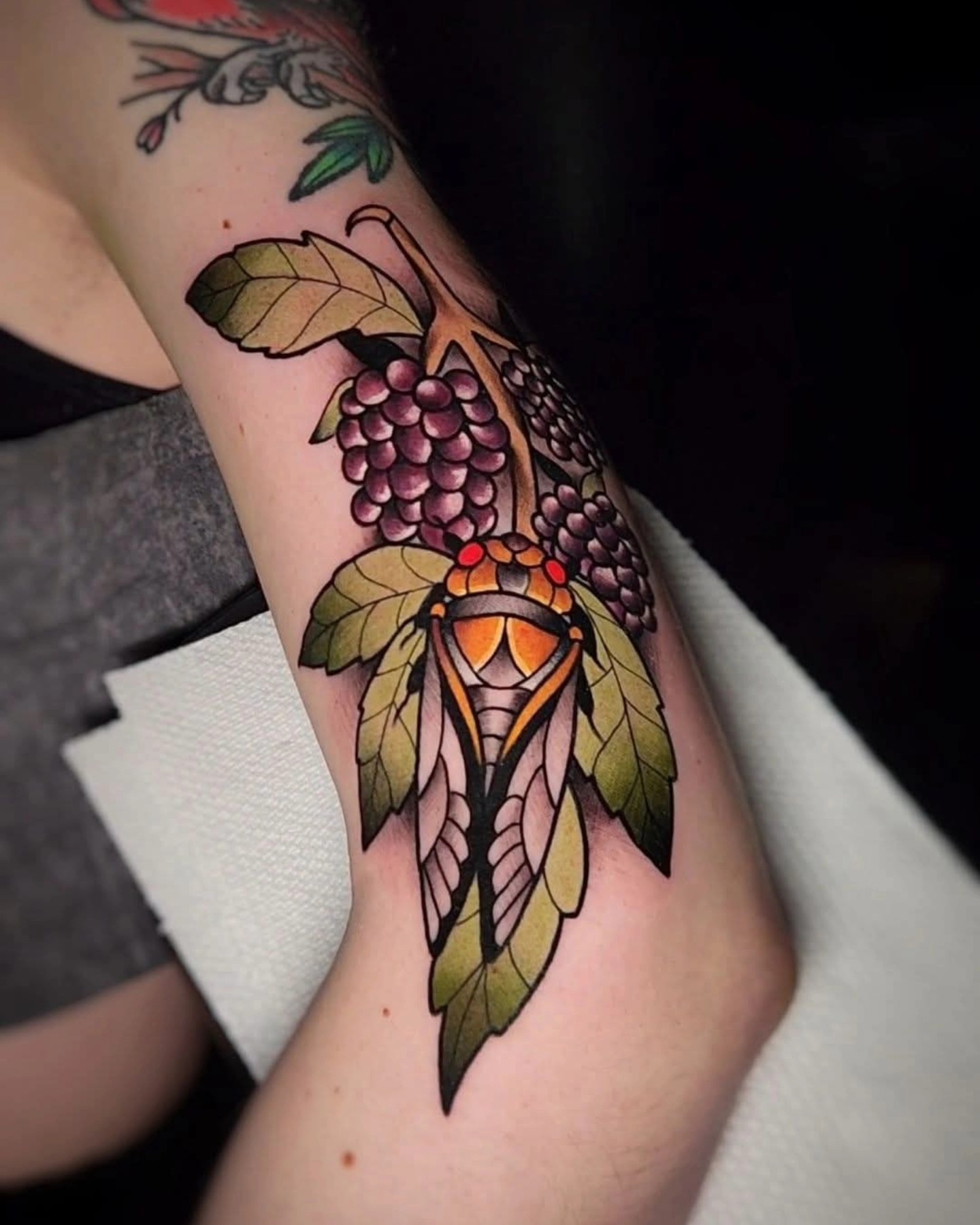 Grapes and leaves American traditional tattoo on the forearm by ⚔️ Shane ⚔️