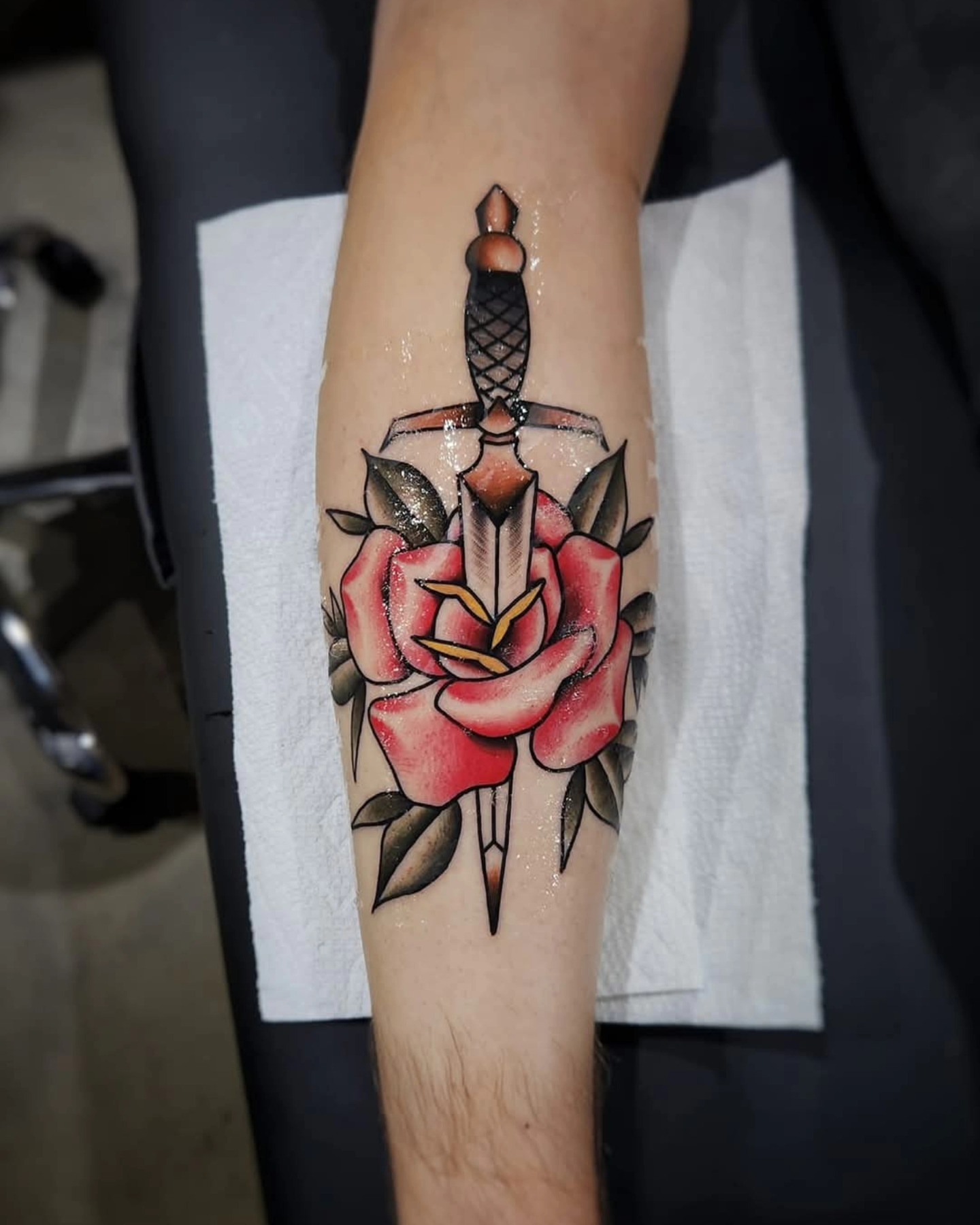 Sword and rose American traditional tattoo on the forearm by ⚔️ Shane ⚔️
