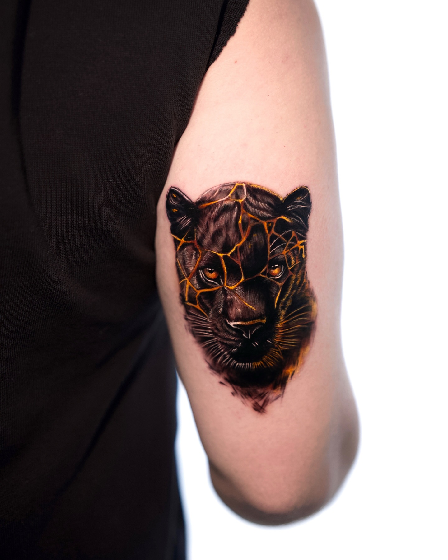 Panther dark realism tattoo on the forearm by serenay akçiçek