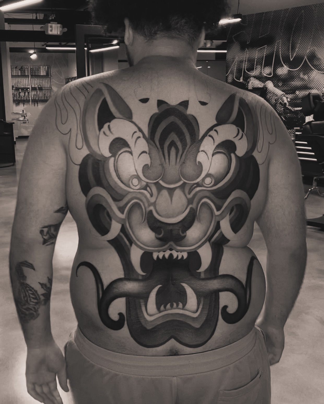 Lion mask japanese irezumi tattoo on the back by Tattoo artist in Charlotte,NC
