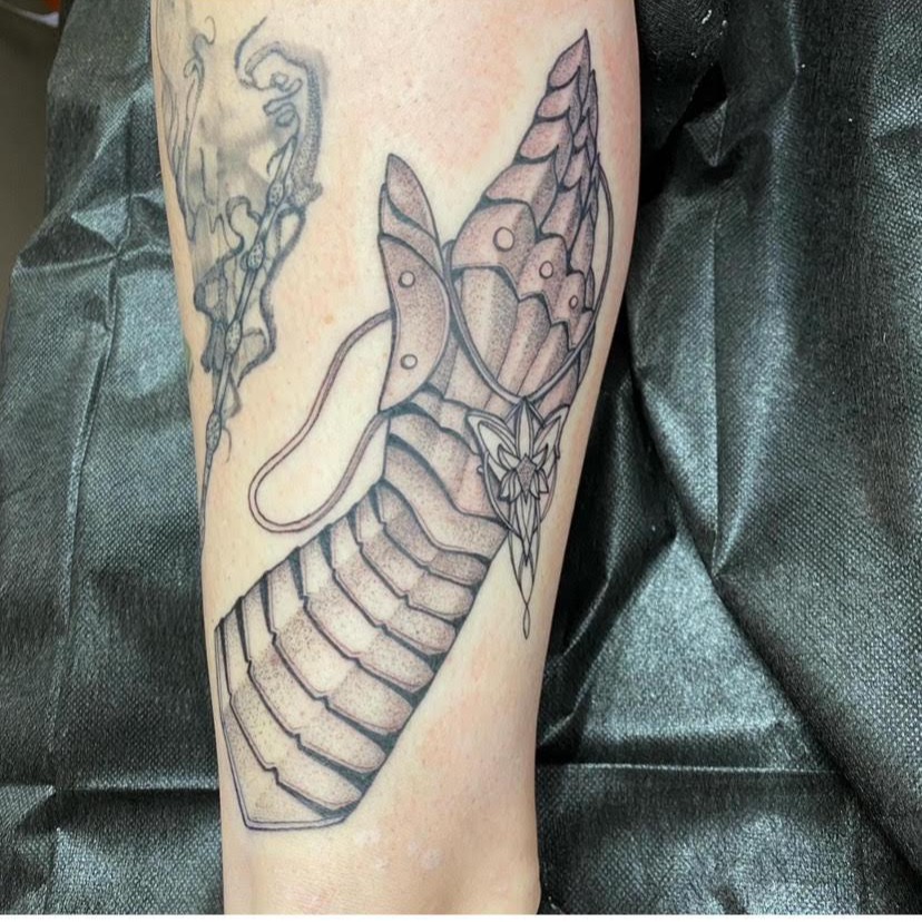 Serpent geometric tattoo on the forearm by Amber Lea, Kansas City, Kansas
