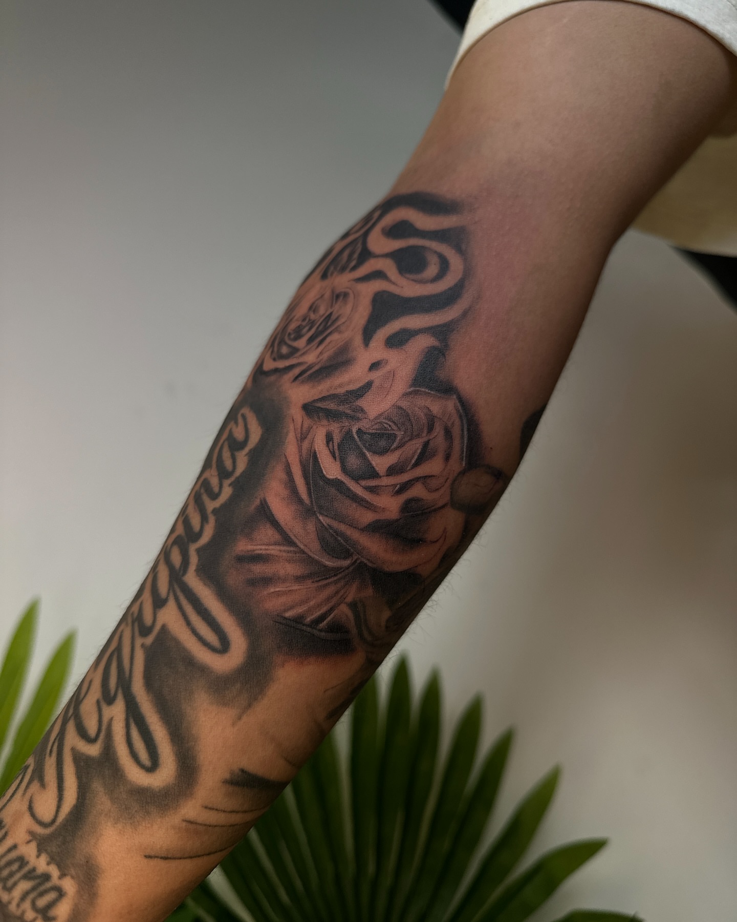 Rose realism tattoo on the forearm by ᴡᴏʀᴍ