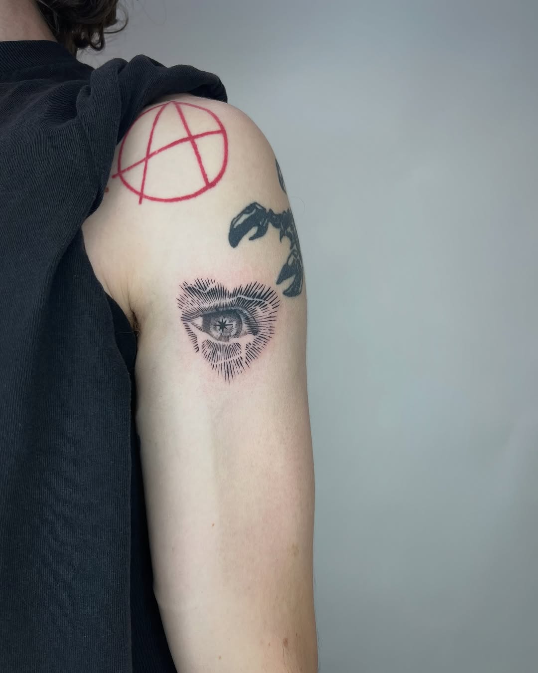 Eye with radiating lines dotwork tattoo on the forearm by 🤍 Sarah 🖤