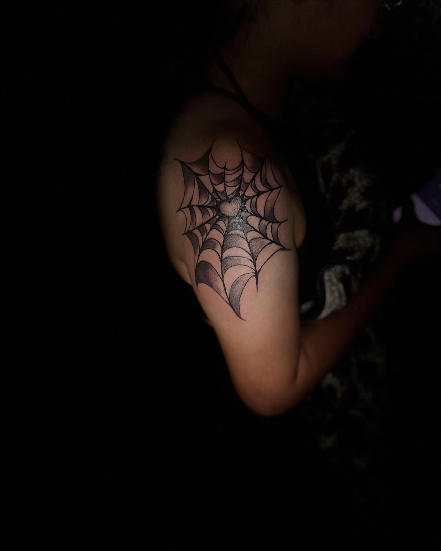 Spider web dotwork tattoo on the shoulder by Aj Negrete Jr.