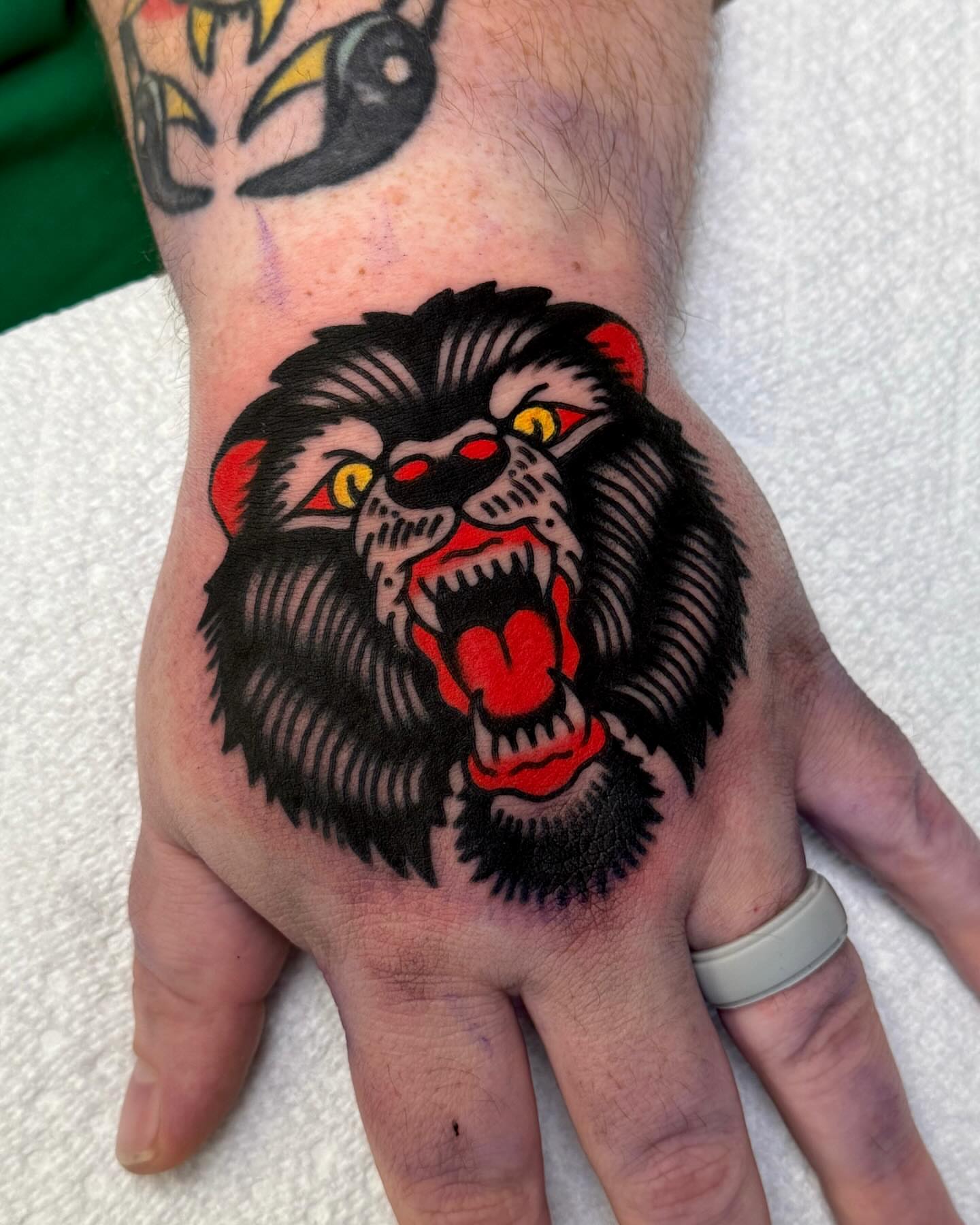 Angry bear American traditional tattoo on the hand by Zachary - Traditional Tattoo Artist