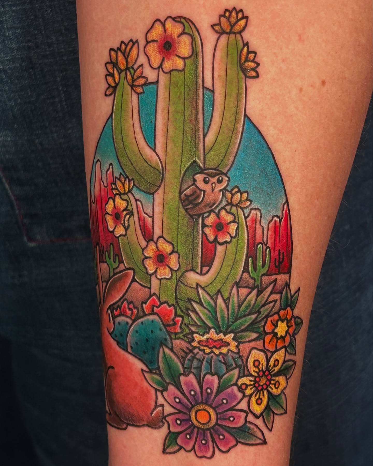 Cactus and bird American traditional tattoo on the forearm by Mallory