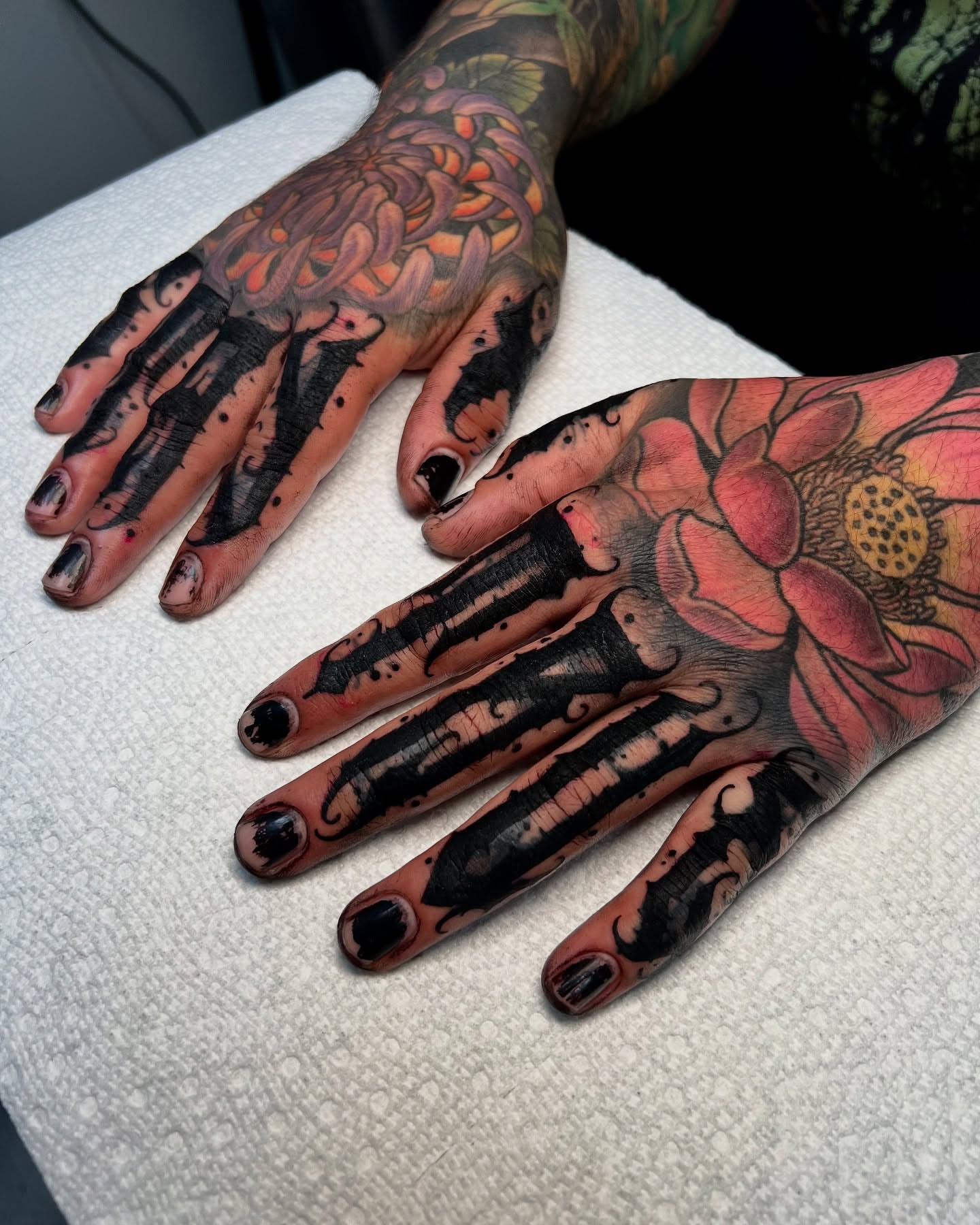 Lotus flower dotwork tattoo on the hand by James Foltz