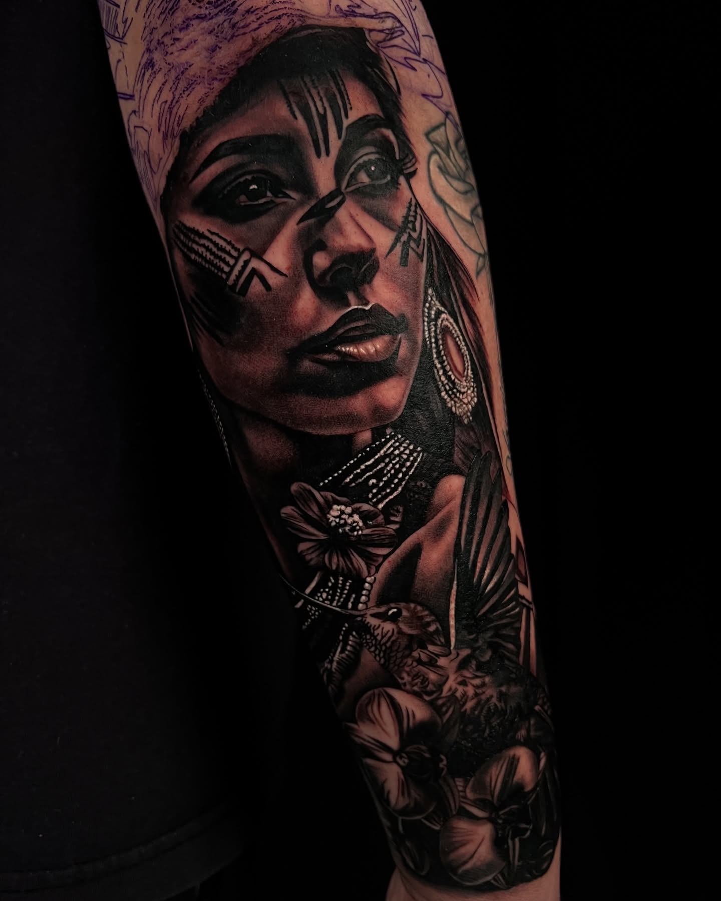 Woman's face realism tattoo on the forearm by Natalie Shaw