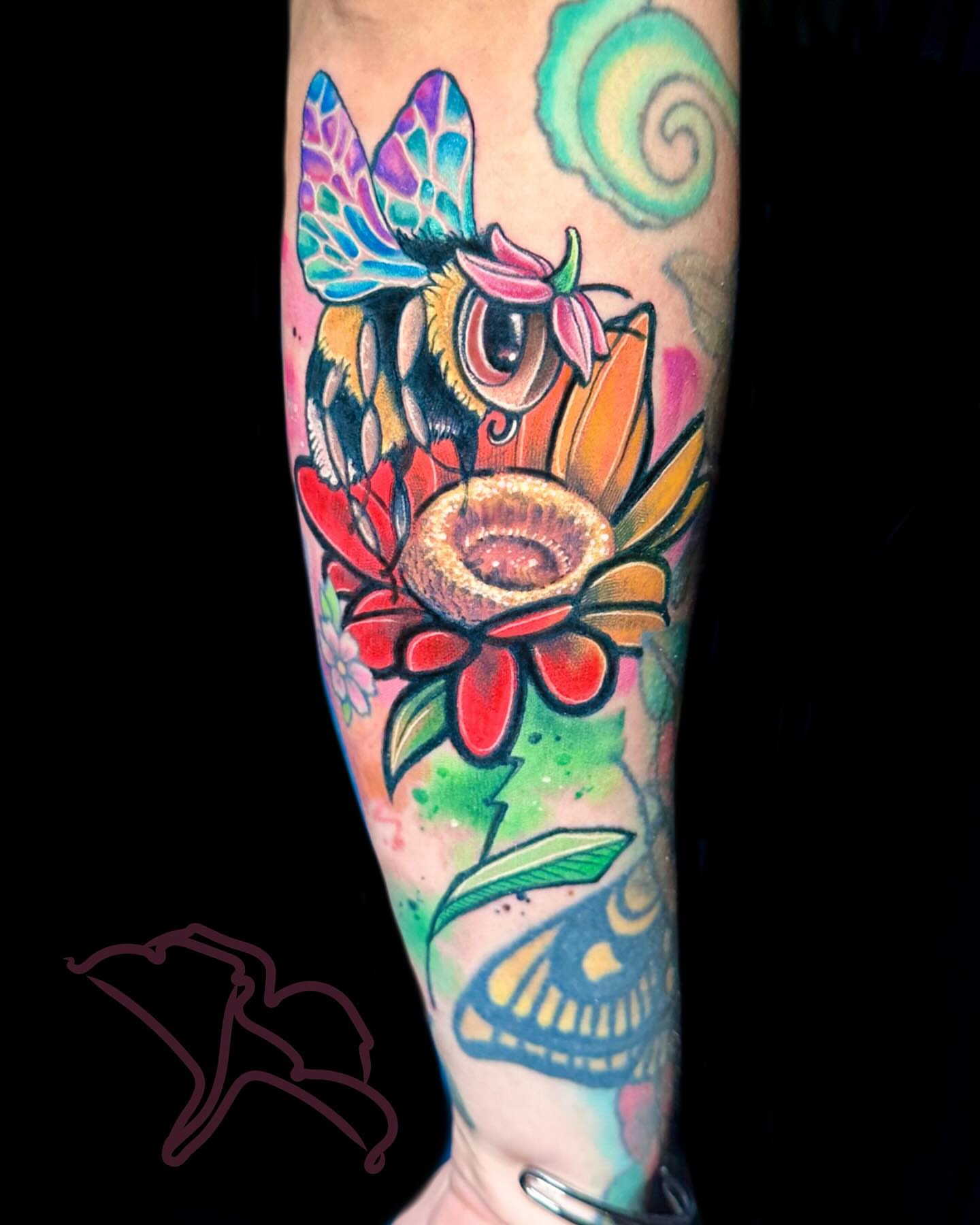 Bee and flower American traditional tattoo on the forearm by Alena Petunia