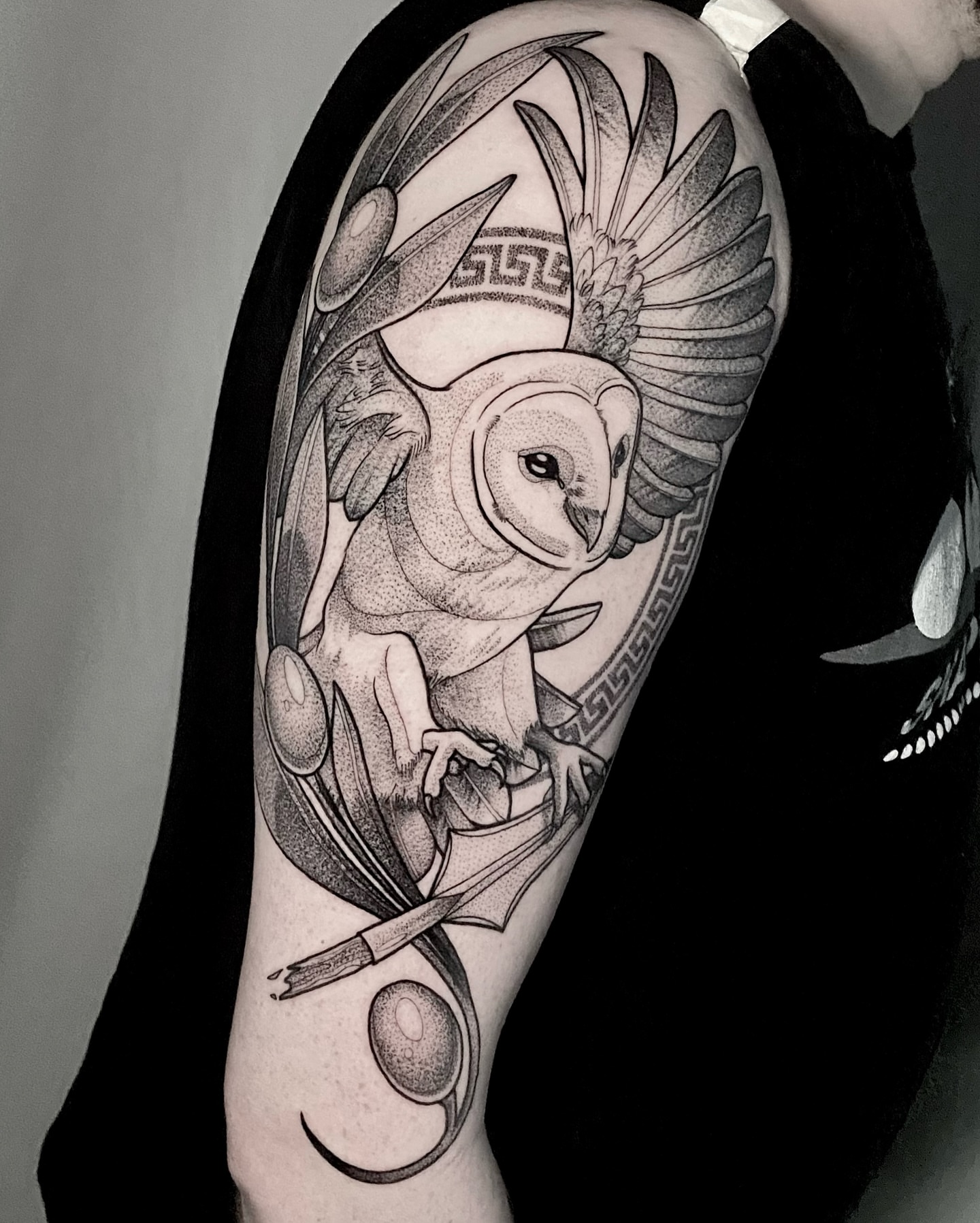 Owl dotwork tattoo on the forearm by Rowan Starr