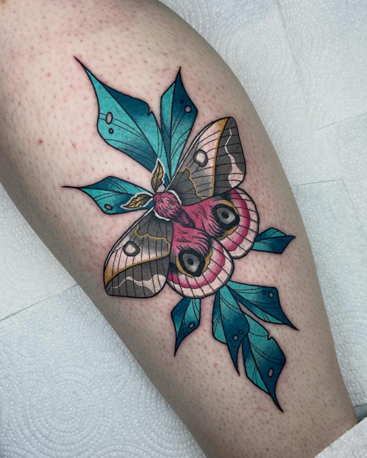 Moth and leaves new school tattoo on the thigh by ππππππ