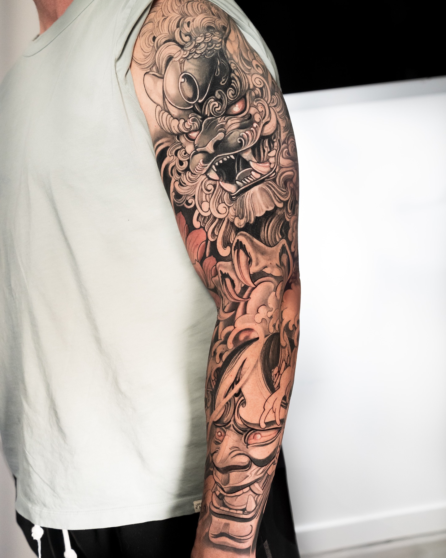 Lion mask japanese irezumi tattoo on the forearm by Andres Acevedo, Denver, Colorado