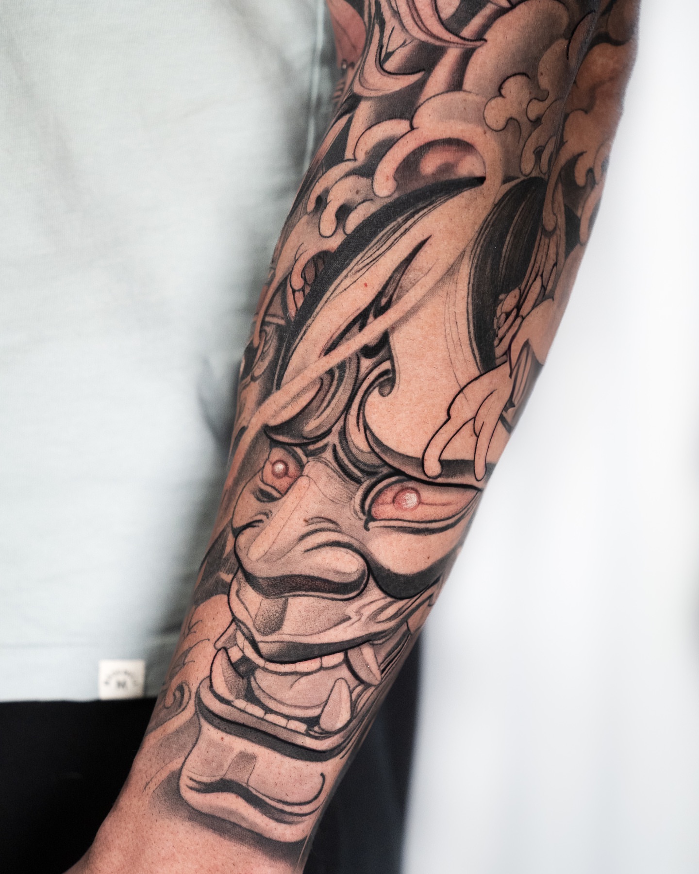Mask japanese irezumi tattoo on the forearm by Andres Acevedo, Denver, Colorado