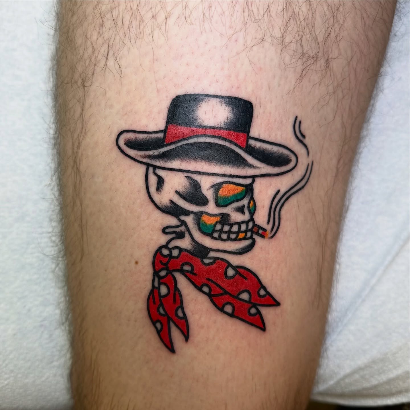 Skull wearing hat and bandana American traditional tattoo on the forearm by Kyle O’Hara ॐ, Nashville, Tennessee