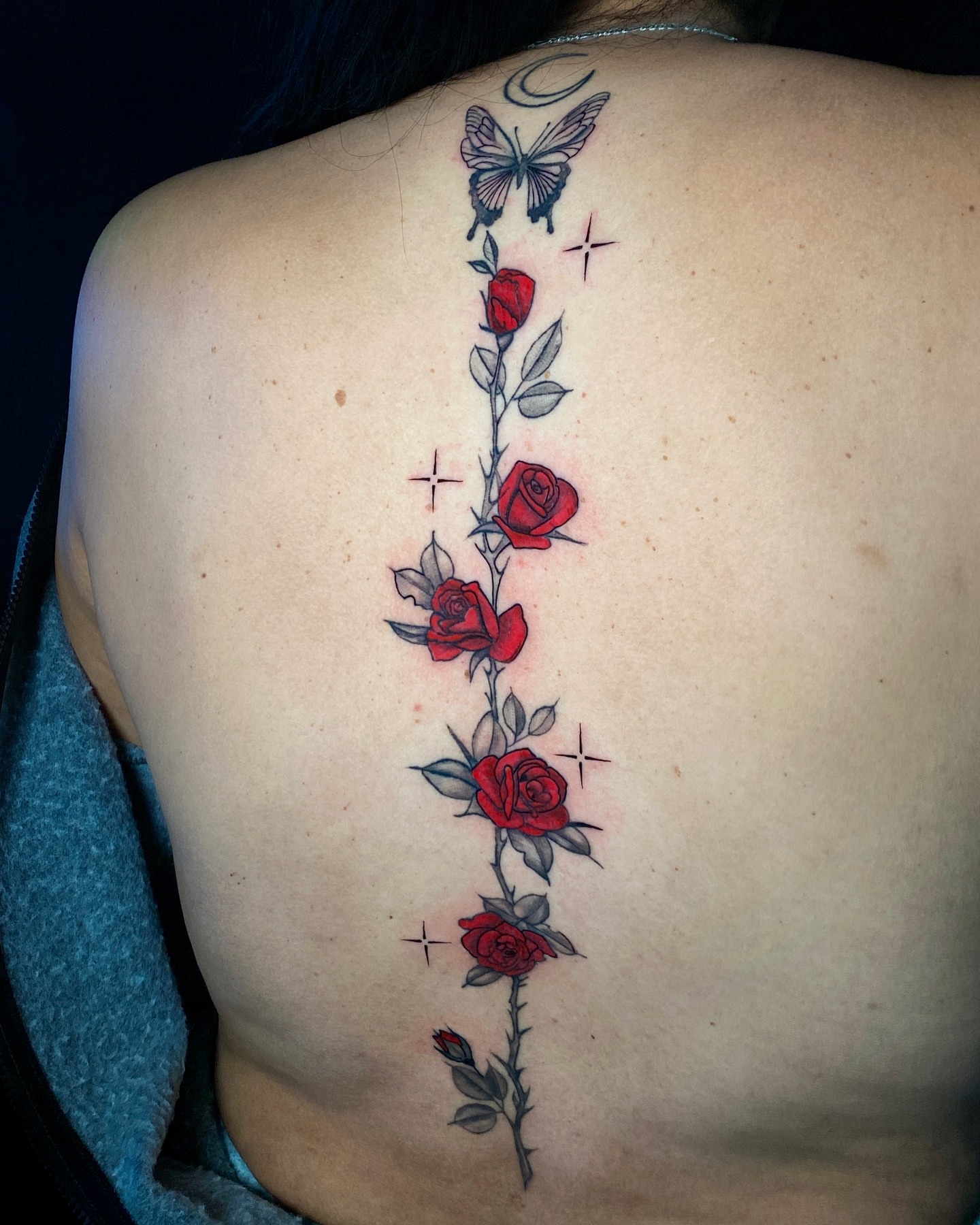 Roses and butterfly neo-traditional tattoo by Alex Cantor