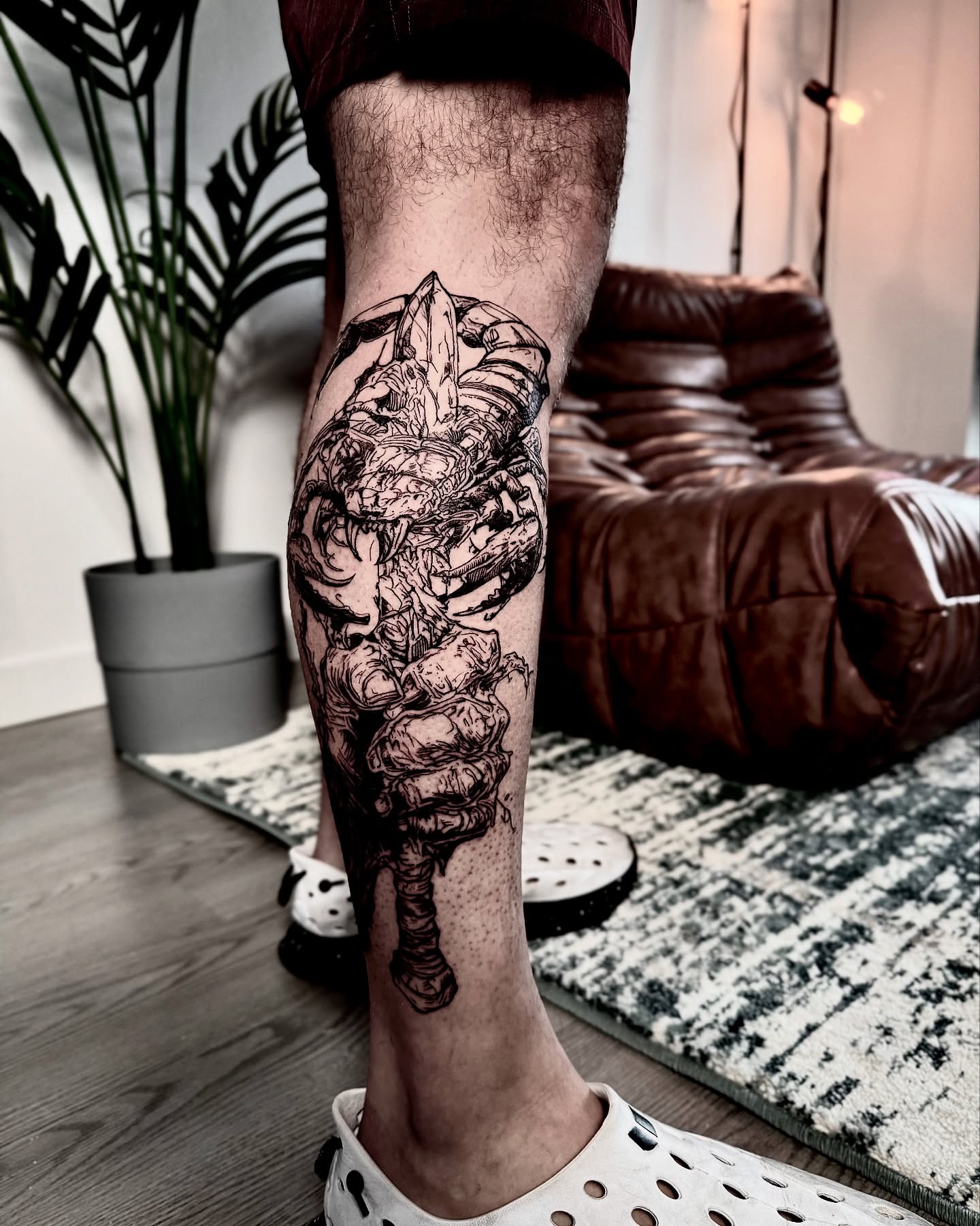Military soldier black and grey tattoo on the calf by Bwk Dark Art