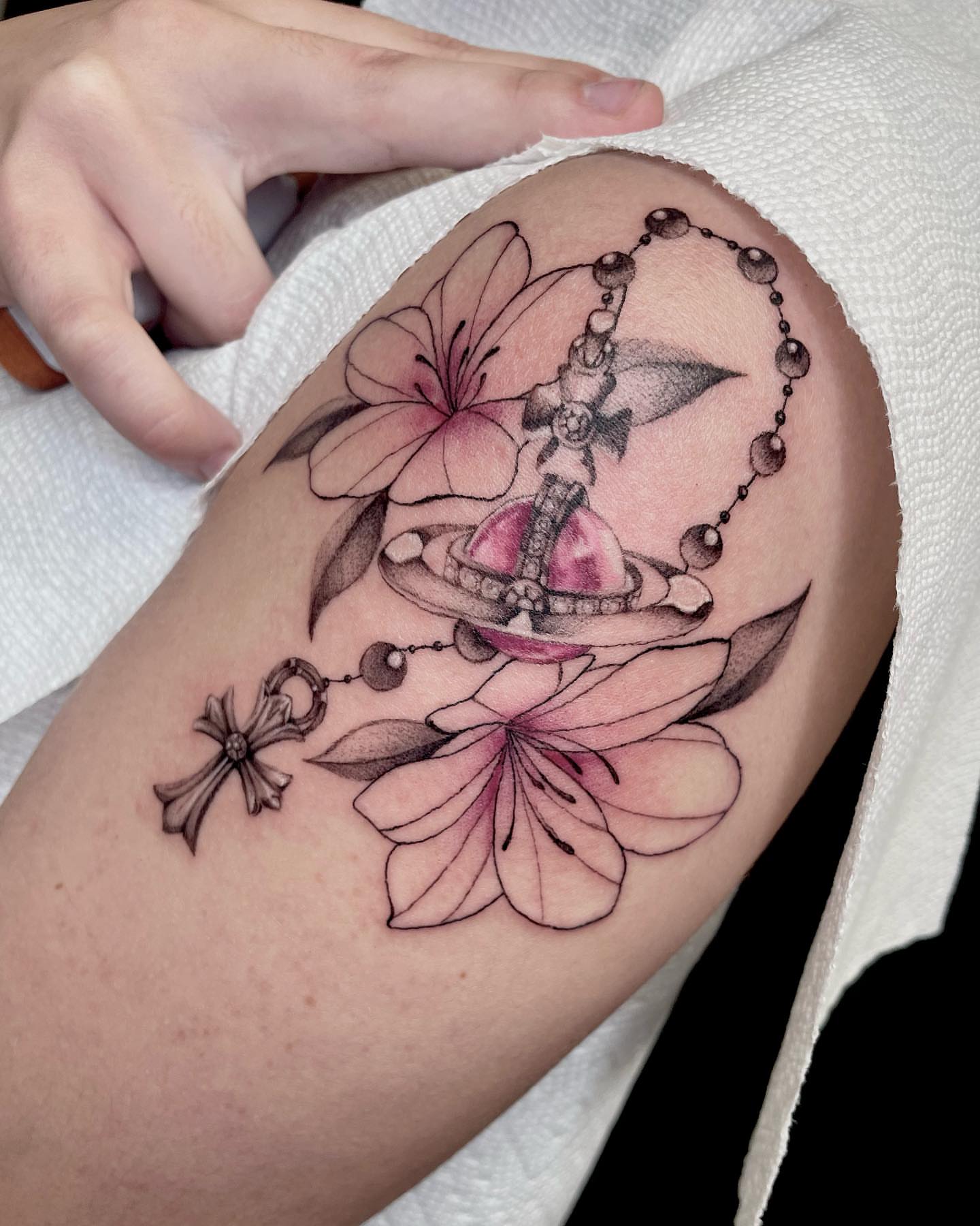 Roses and rosary realism tattoo on the forearm by madison, Cincinnati