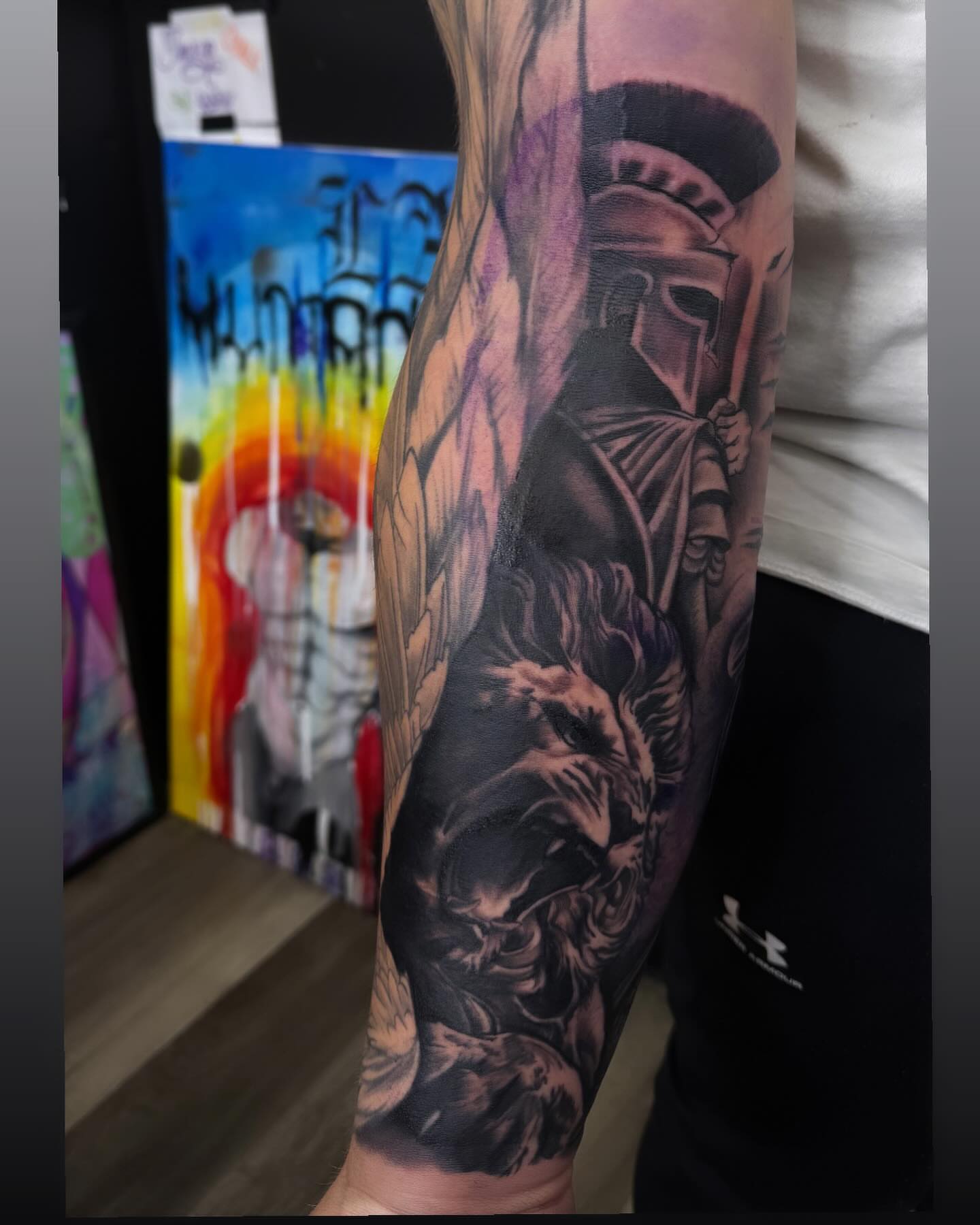 Spartan warrior and lion realism tattoo on the forearm by Lu Ve, Dayton, Ohio