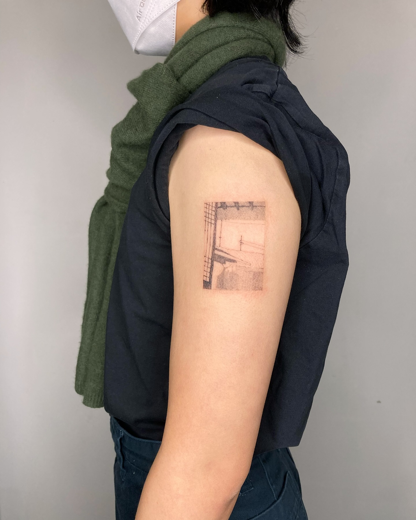 Building facade black and grey tattoo on the upper arm by 잡초