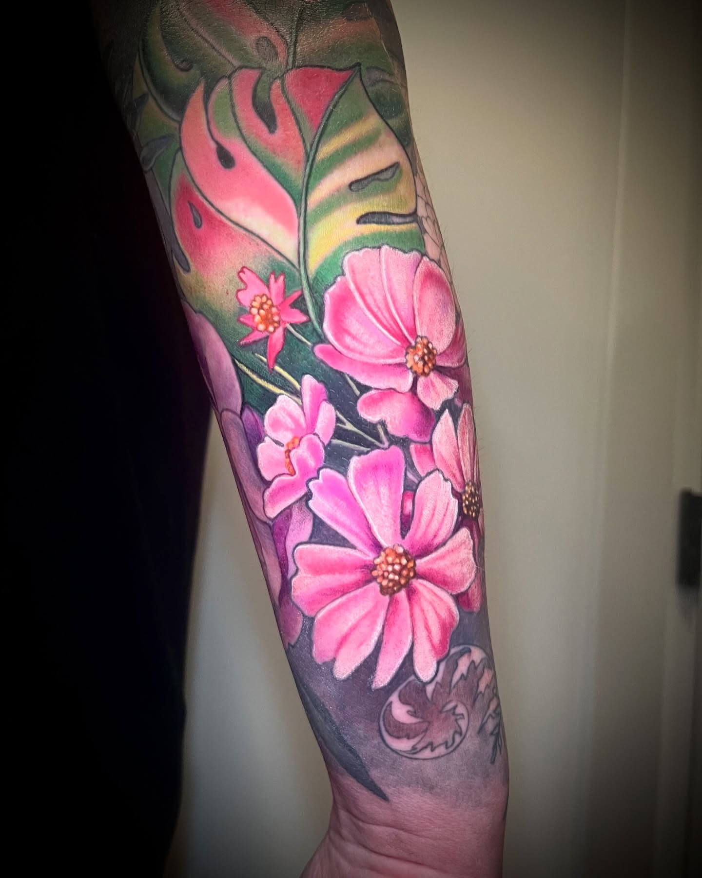 Flowers new school tattoo on the forearm by Jessica Brown