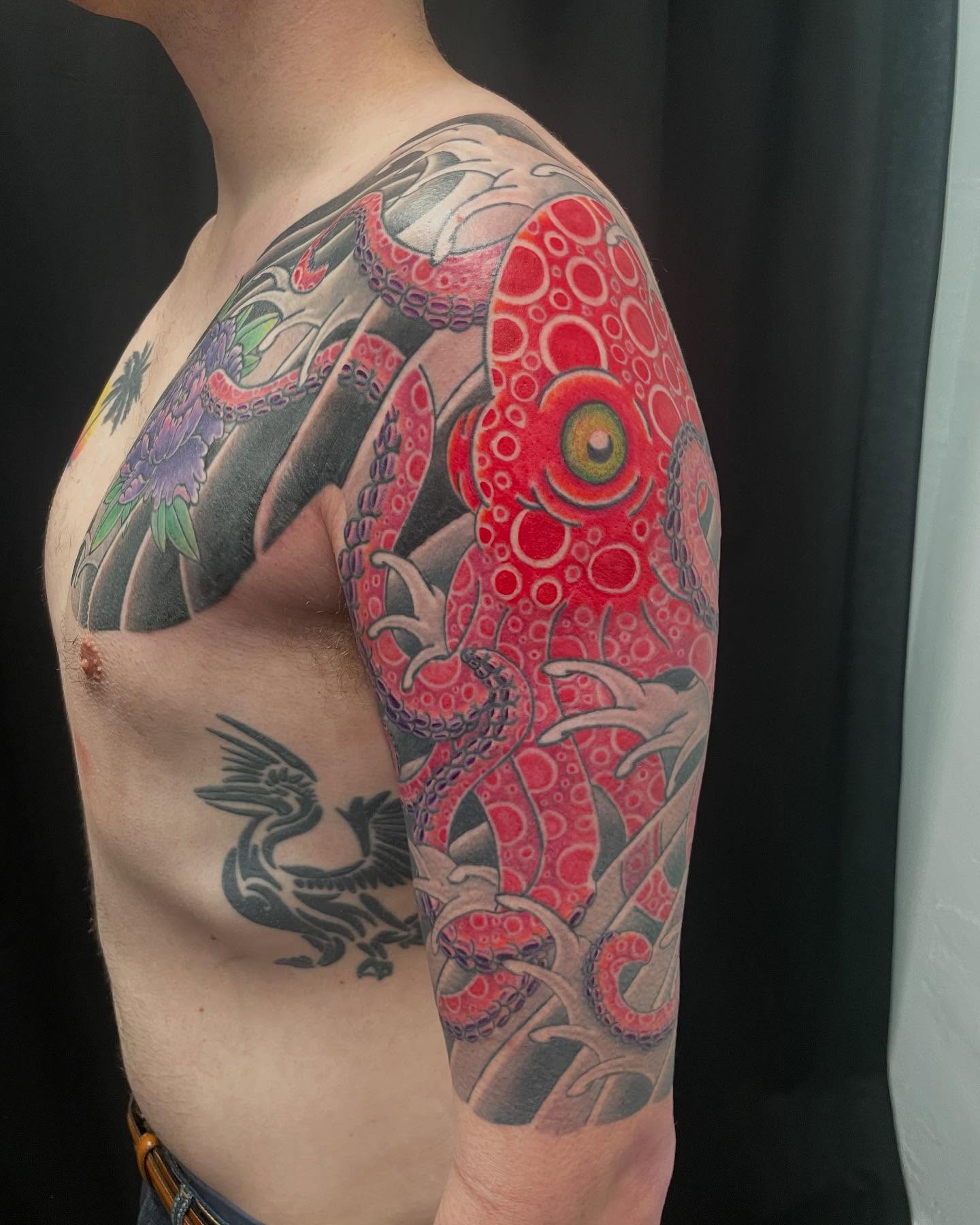 Koi fish and floral japanese irezumi tattoo on the upper arm by Ei Horimiya Omiya