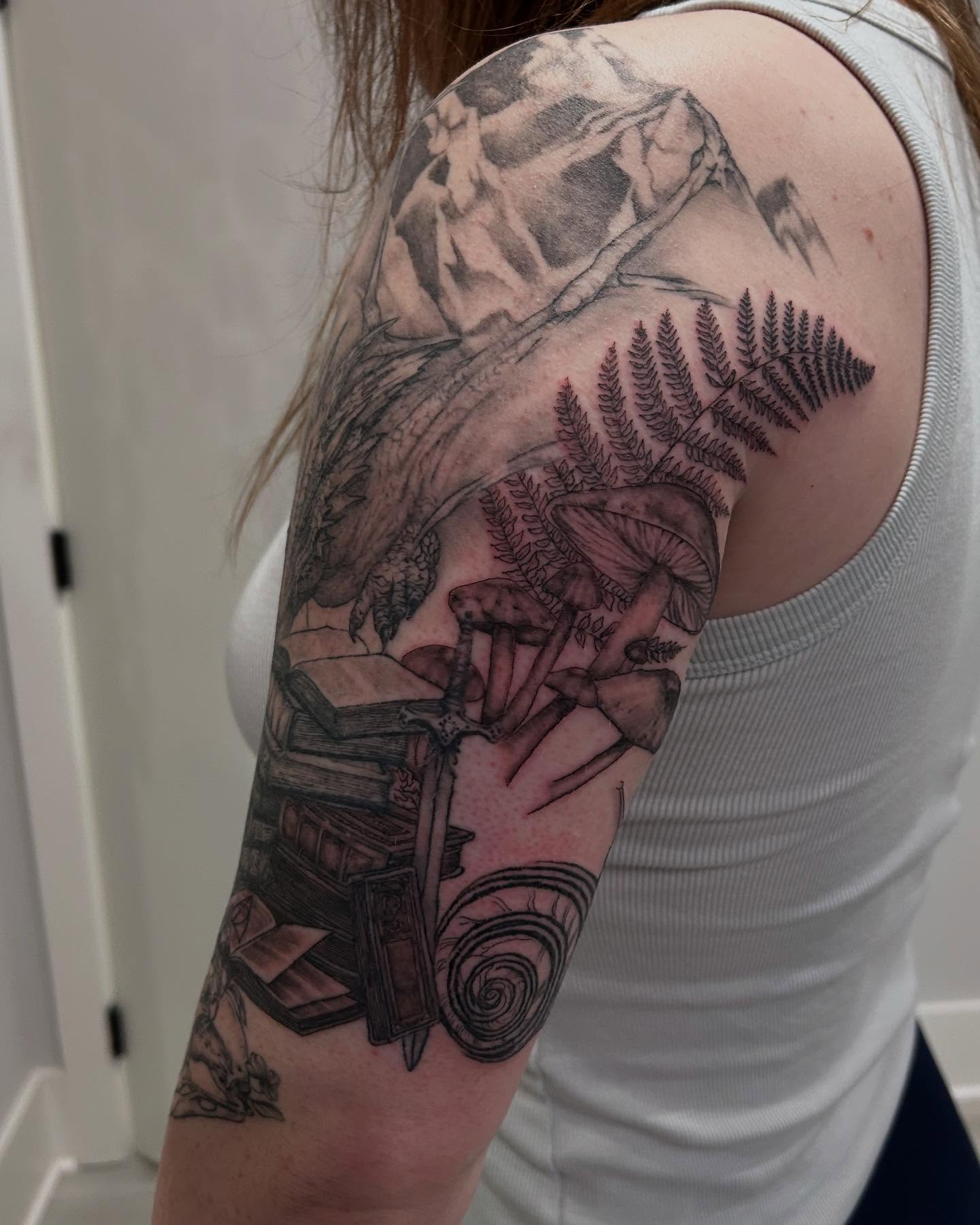 Forest scene realism tattoo on the upper arm by Jbtattoo Artistry