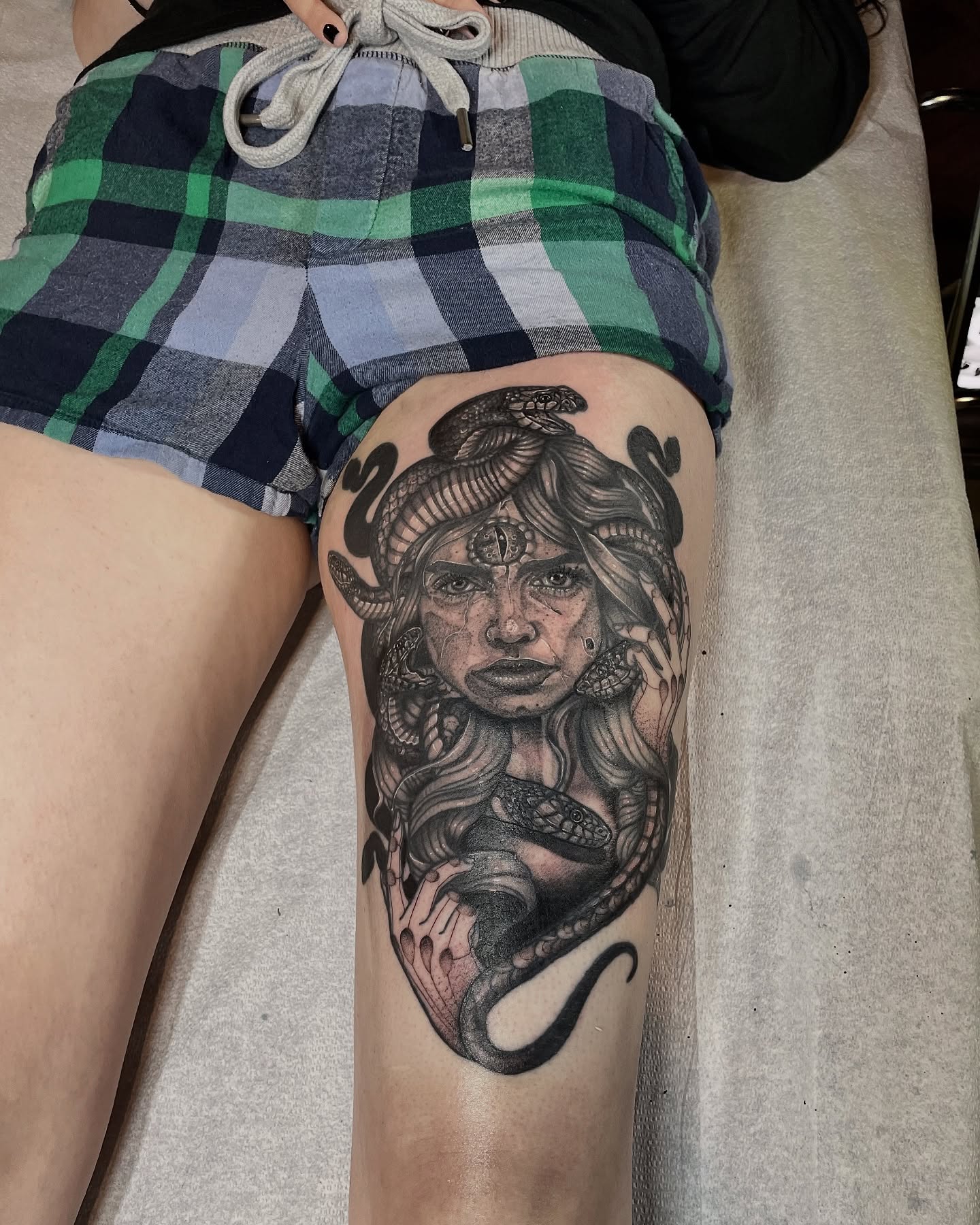 Medusa realism tattoo on the thigh by Danielle