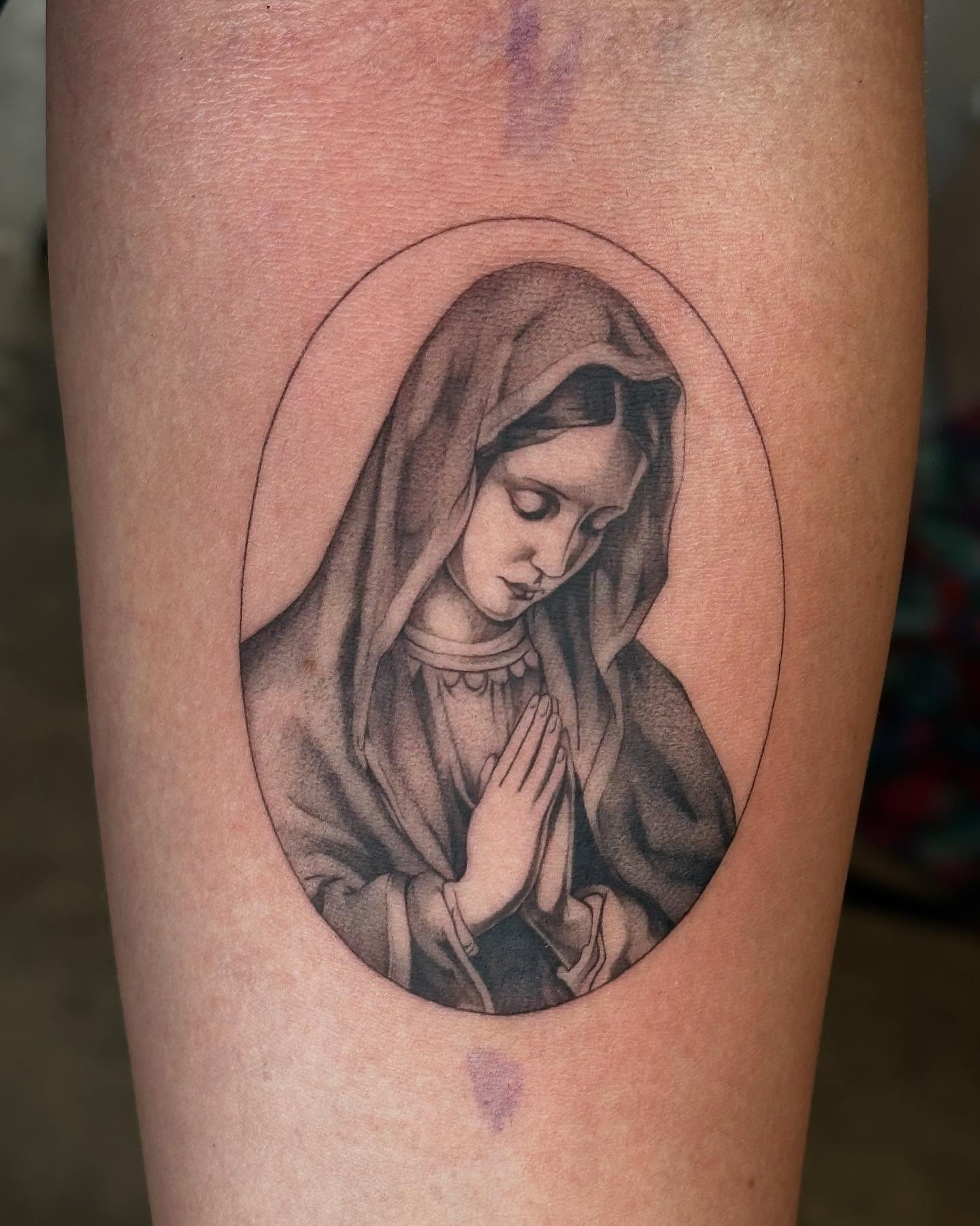 Praying woman black and grey tattoo on the forearm by christy 💌