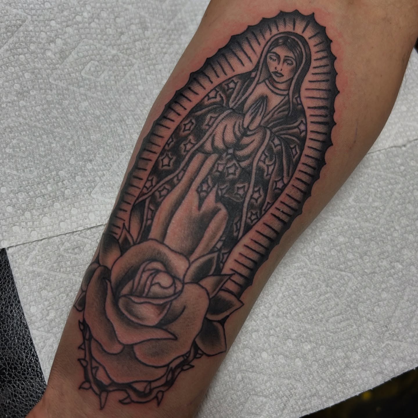Our Lady of Guadalupe American traditional tattoo on the forearm by Lauren Caldwell 🔮🌙