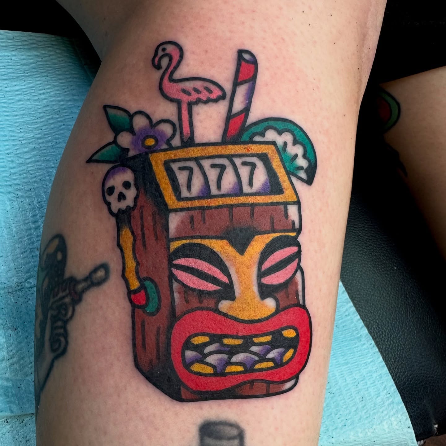 Tiki mask American traditional tattoo on the forearm by Buddy (Holiday) Orr, Las Vegas, Nevada