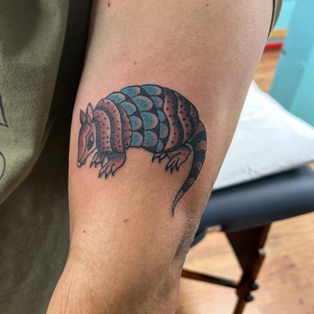 Armadillo American traditional tattoo on the forearm by Elizabeth Niederkorn
