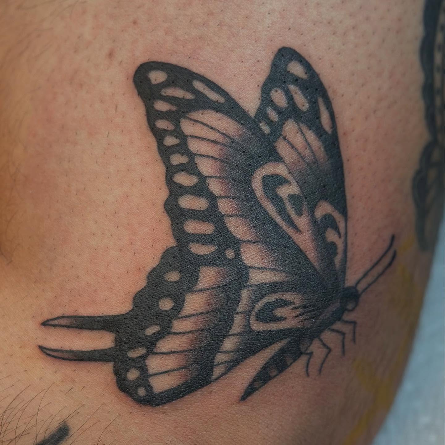 Butterfly black and grey tattoo on the thigh by @ryleecoyote, New York, New York